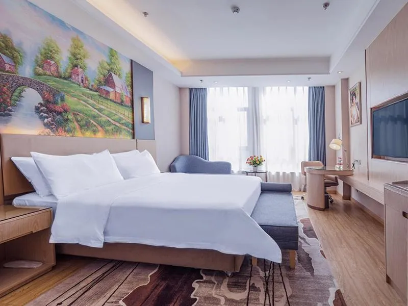 Bed in Vienna International Hotel Chongqing Ranjiaba