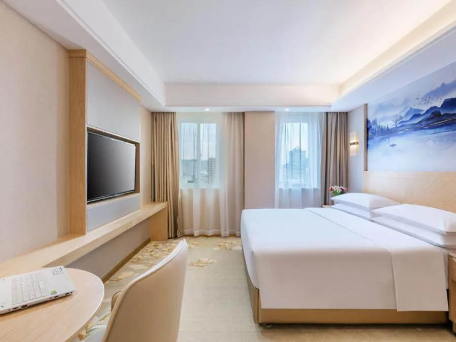 Bed in Vienna International Hotel Taizhou Wenling Branch