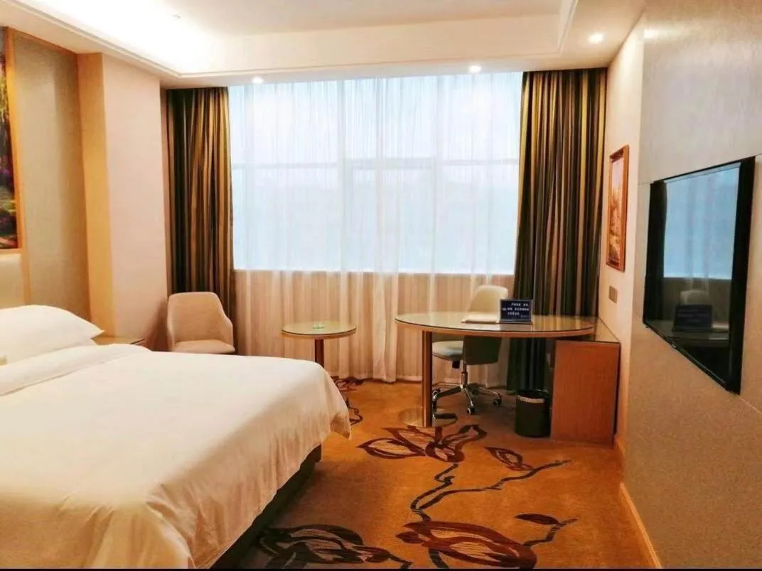 Bed in Vienna International Hotel Zhejiang Wenzhou Ruian Tangxia