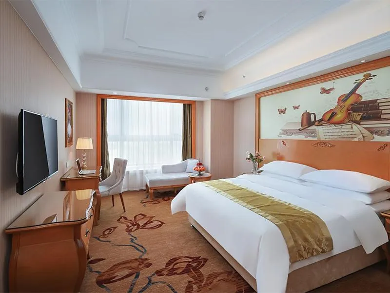 Bed in Vienna International Hotel Wuxi Huishan Yanqiao Metro Station