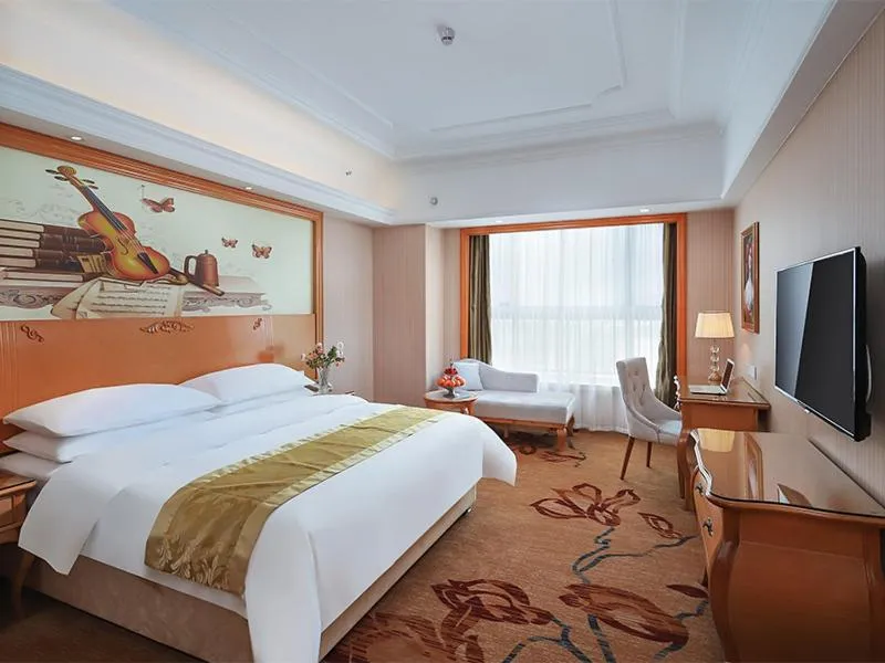 Bed in Vienna International Hotel Wuxi Huishan Yanqiao Metro Station