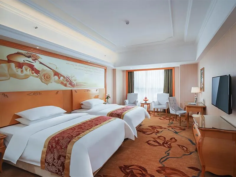 Bed in Vienna International Hotel Wuxi Huishan Yanqiao Metro Station