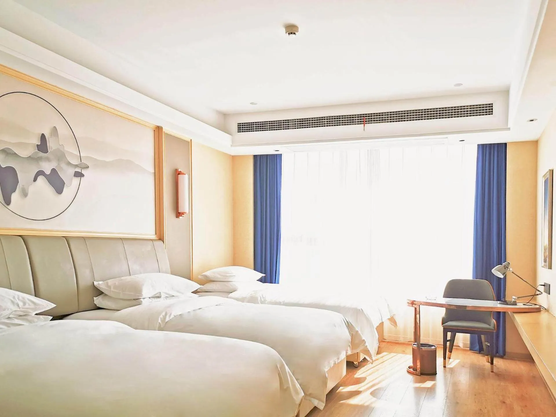 Bed in Vienna International Hotel Jiangsu Wuxi Jiangyin Sports Center