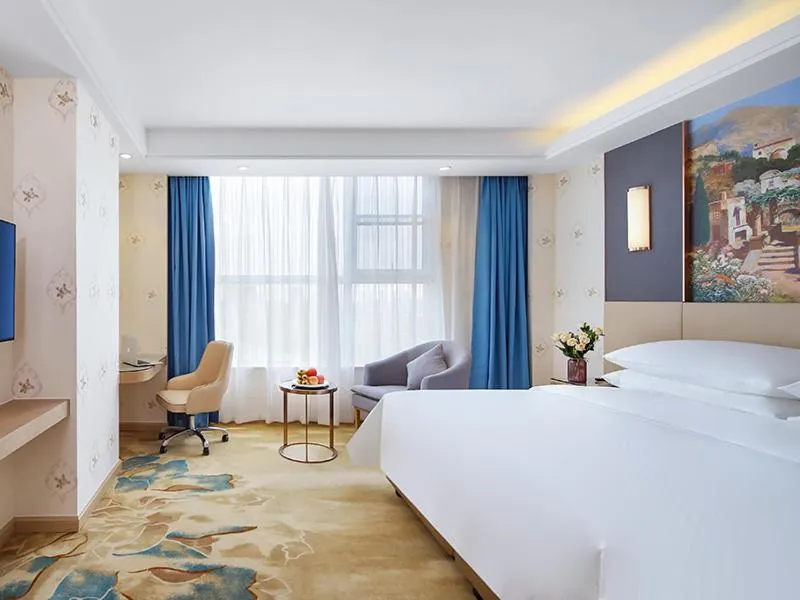 Bed in Vienna International Hotel Jurong Huayang