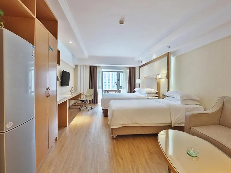 Bed in Vienna Hotel Harbin West Railway Station Wanda Plaza