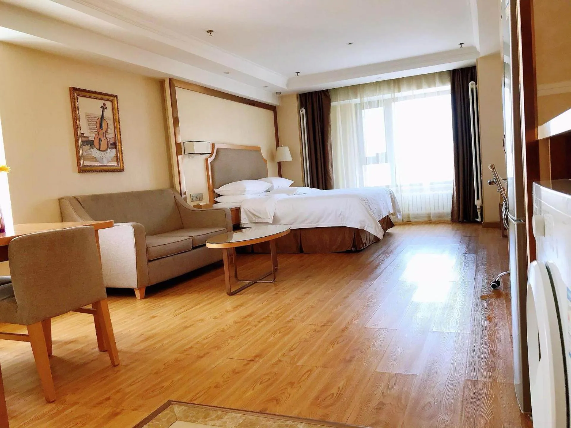 Bed in Vienna Hotel Harbin West Railway Station Wanda Plaza