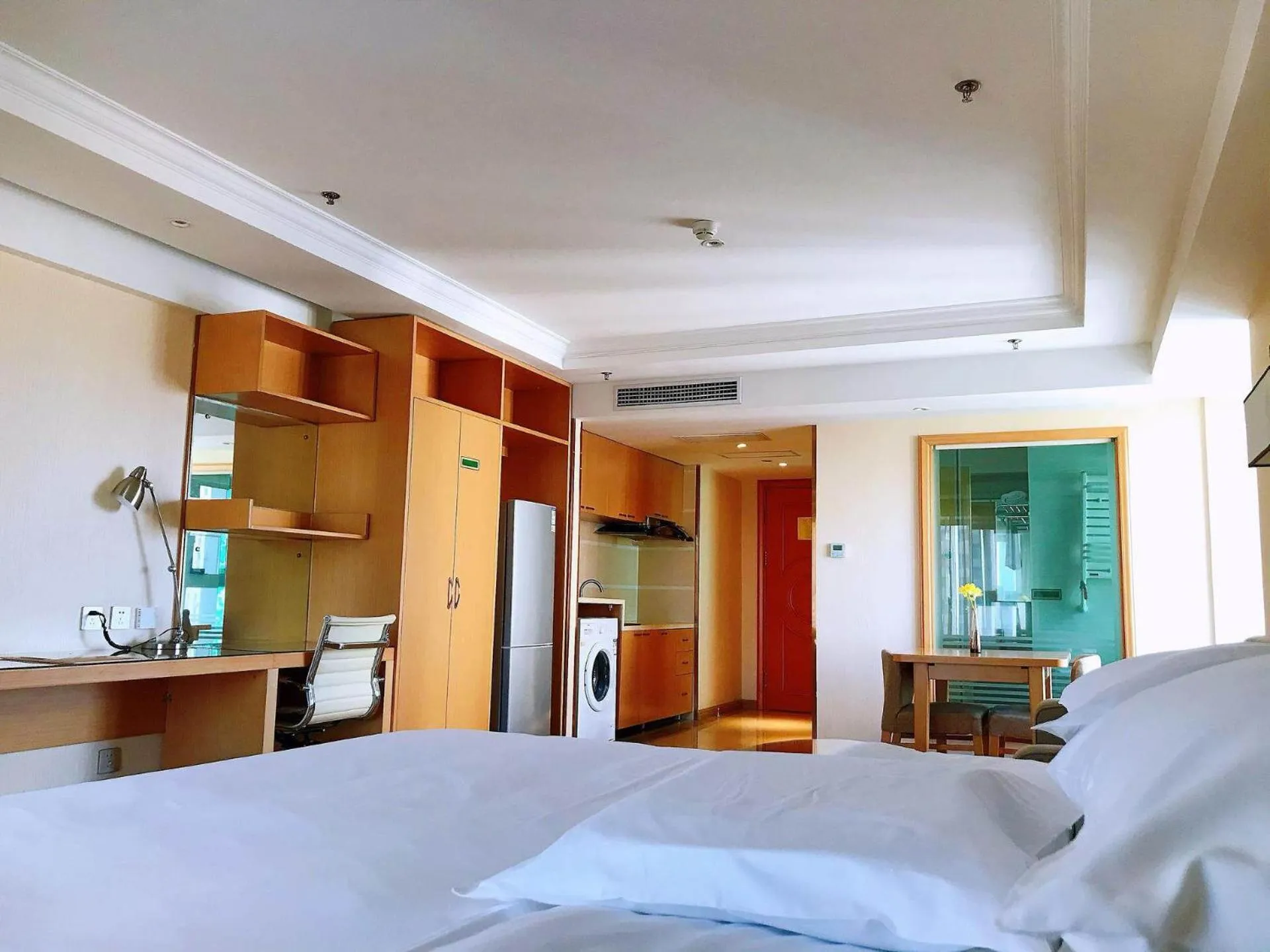 Bed in Vienna Hotel Harbin West Railway Station Wanda Plaza