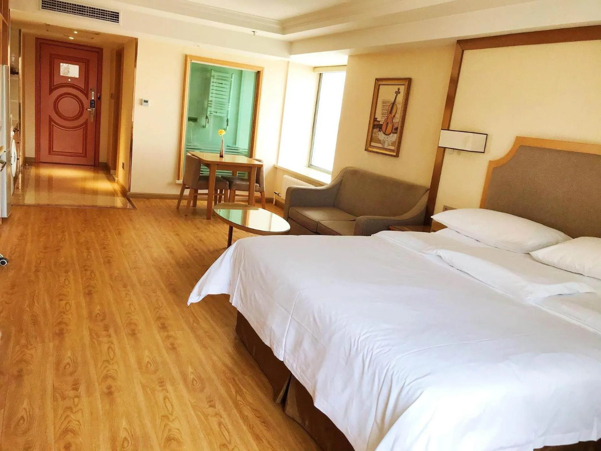 Bed in Vienna Hotel Harbin West Railway Station Wanda Plaza