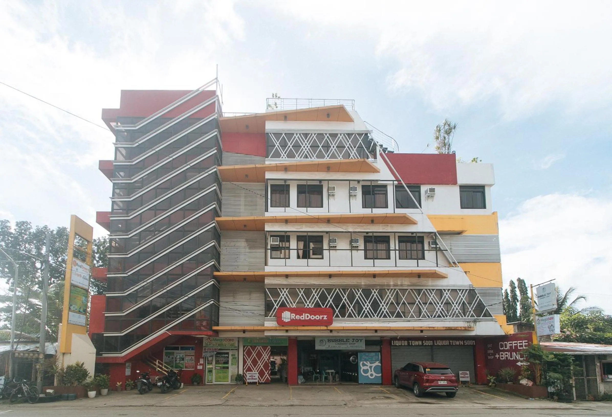 Property building in RedDoorz @ Benelio Suites Pavia Iloilo
