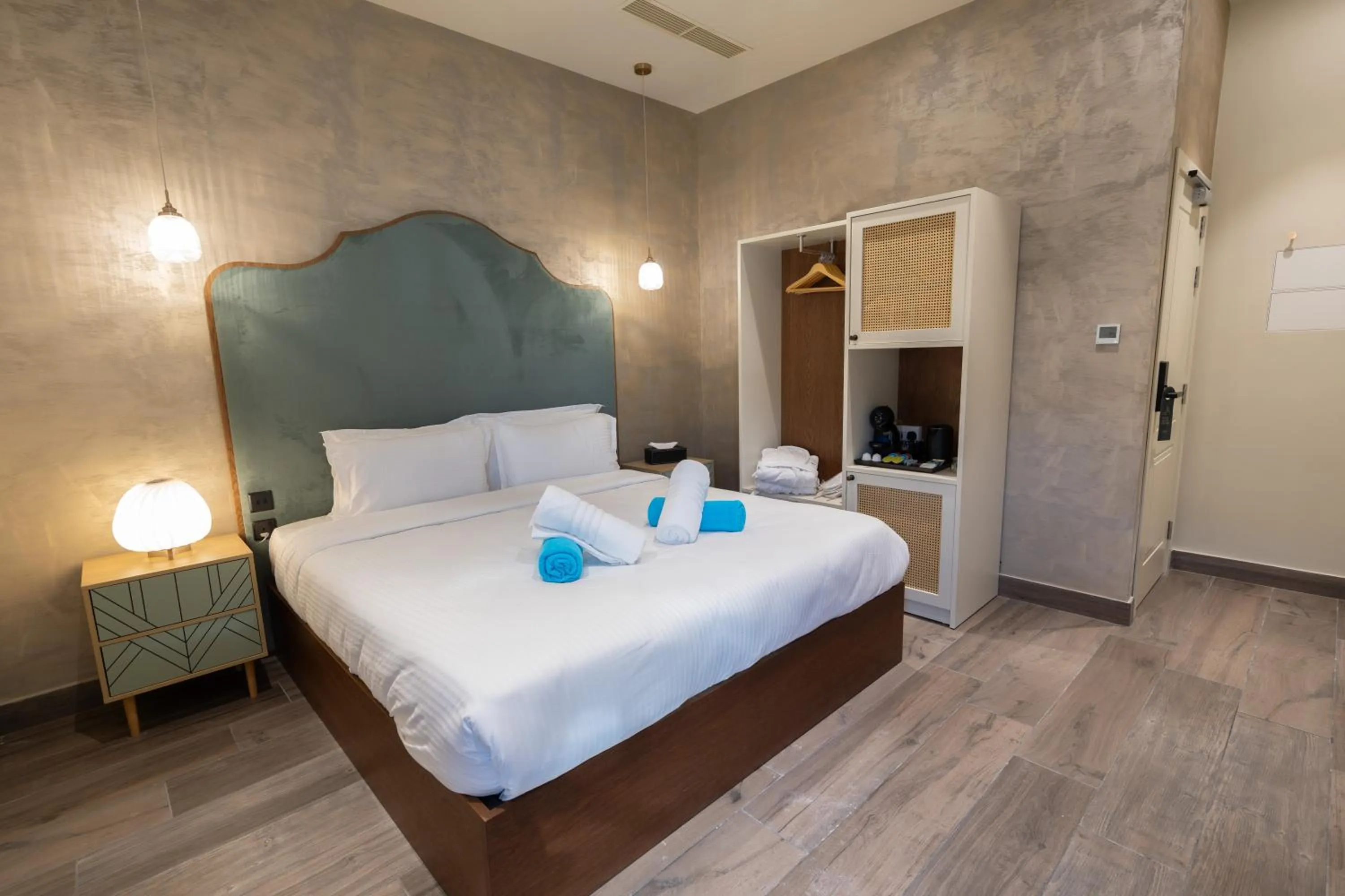 Photo of the whole room, Bed in DOMS Boutique Living