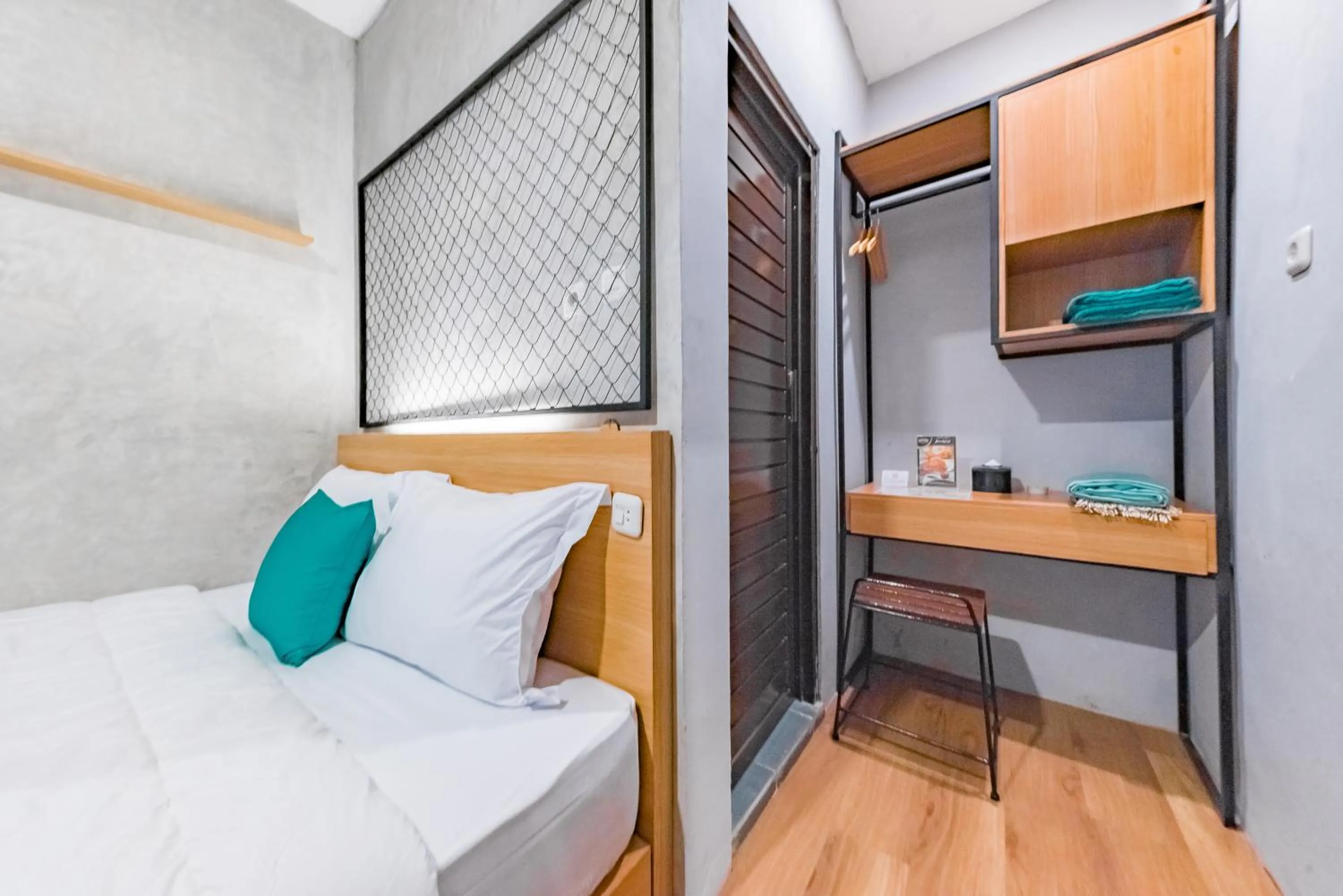 Bed in Ultima Guest House