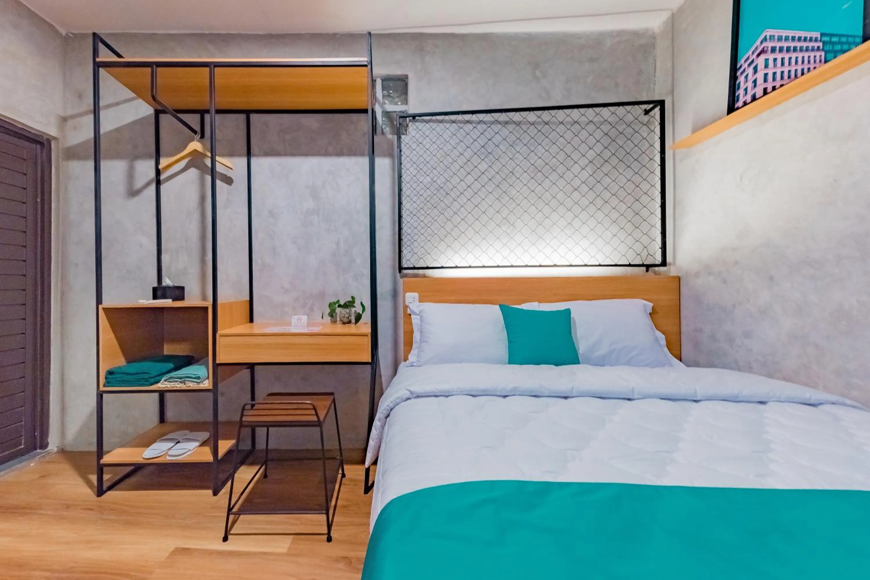 Bed in Ultima Guest House