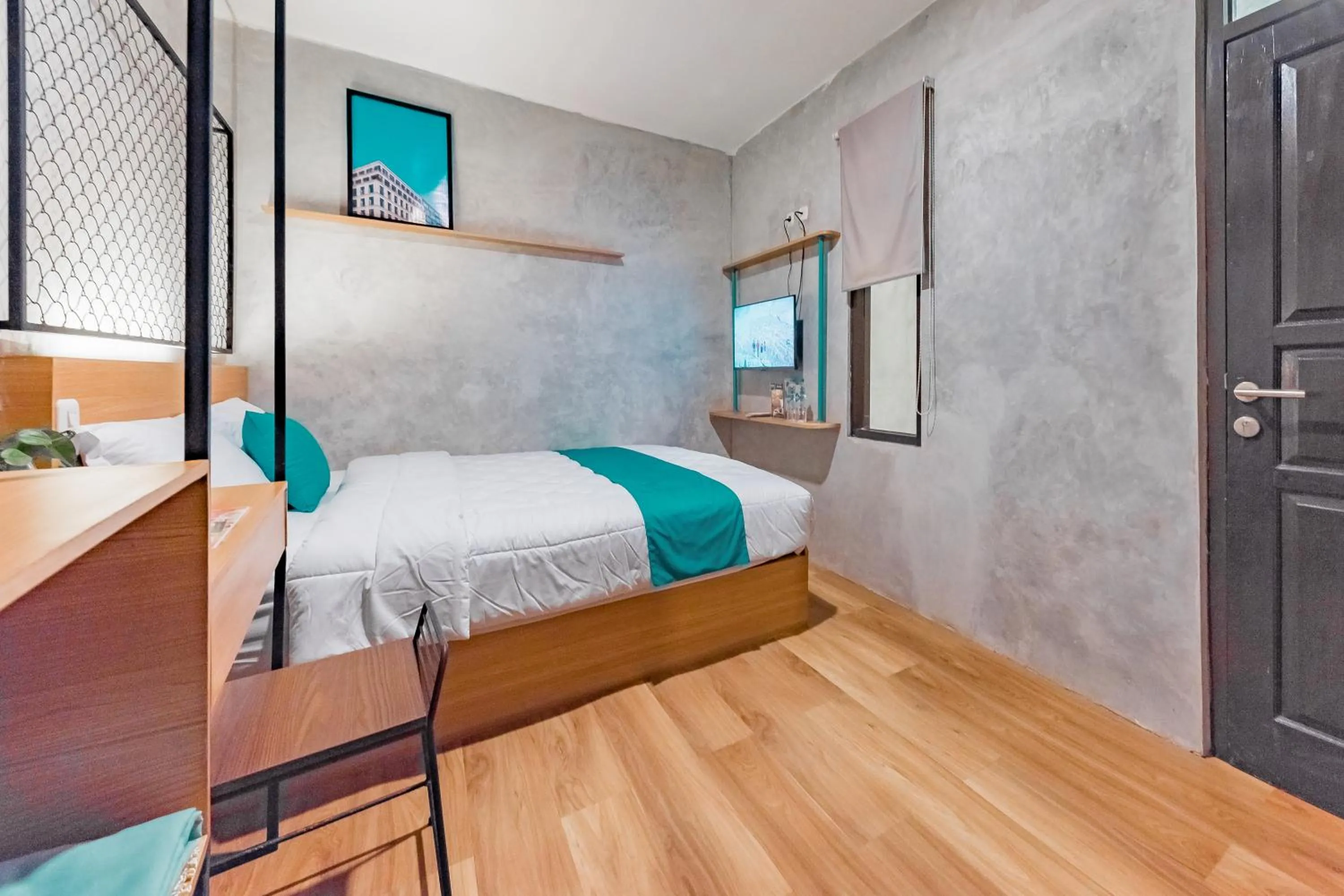 Bed in Ultima Guest House