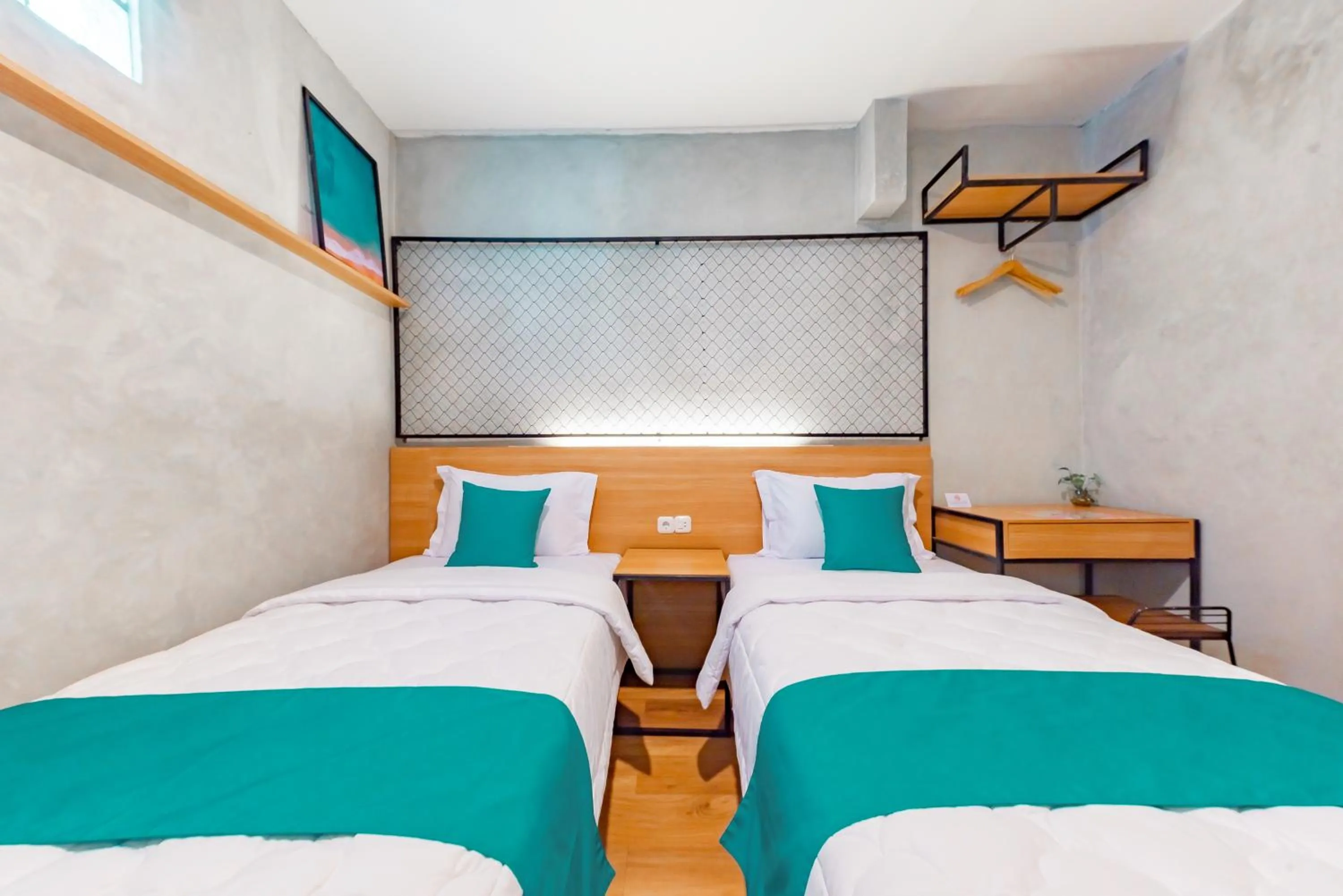 Bed in Ultima Guest House