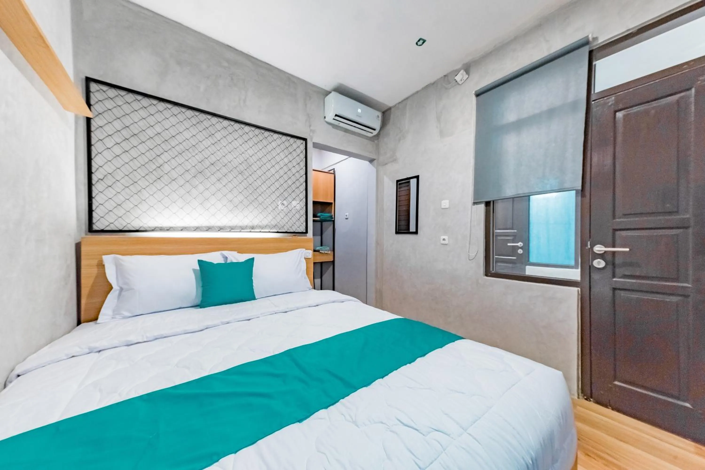 Bed in Ultima Guest House