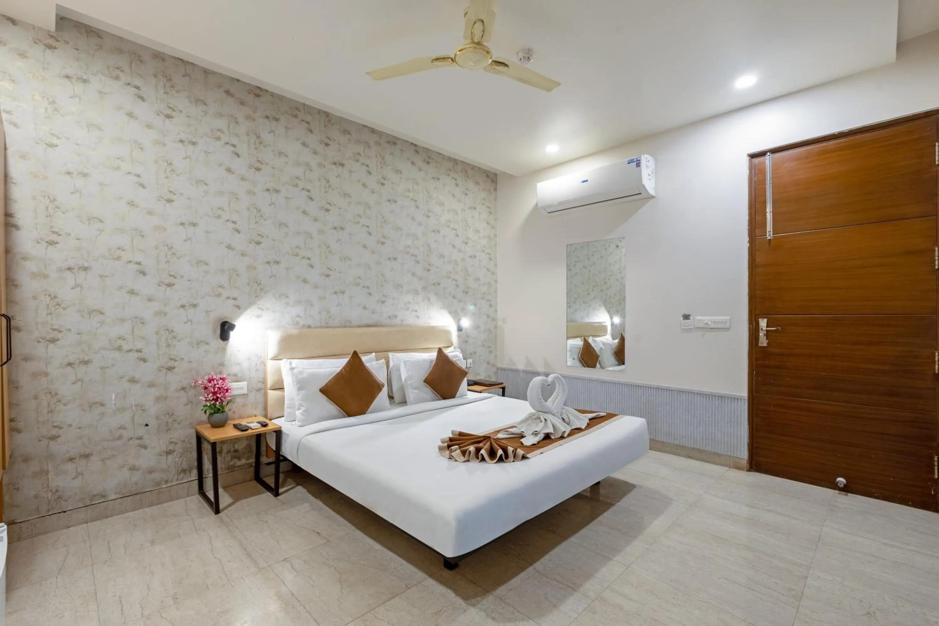 Bed in Aadat Hotel Subhash Chowk Gurgaon