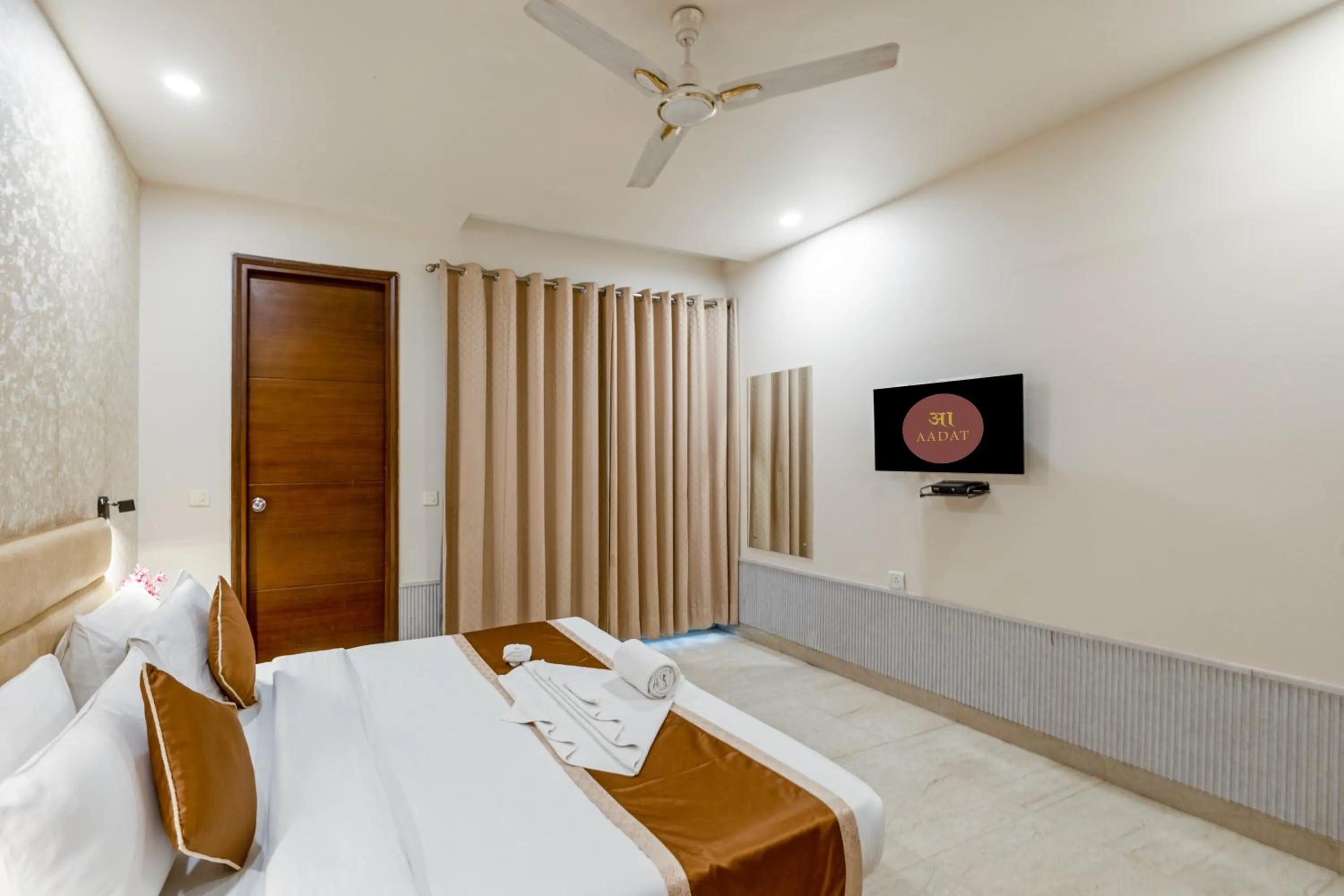 Bed in Aadat Hotel Subhash Chowk Gurgaon