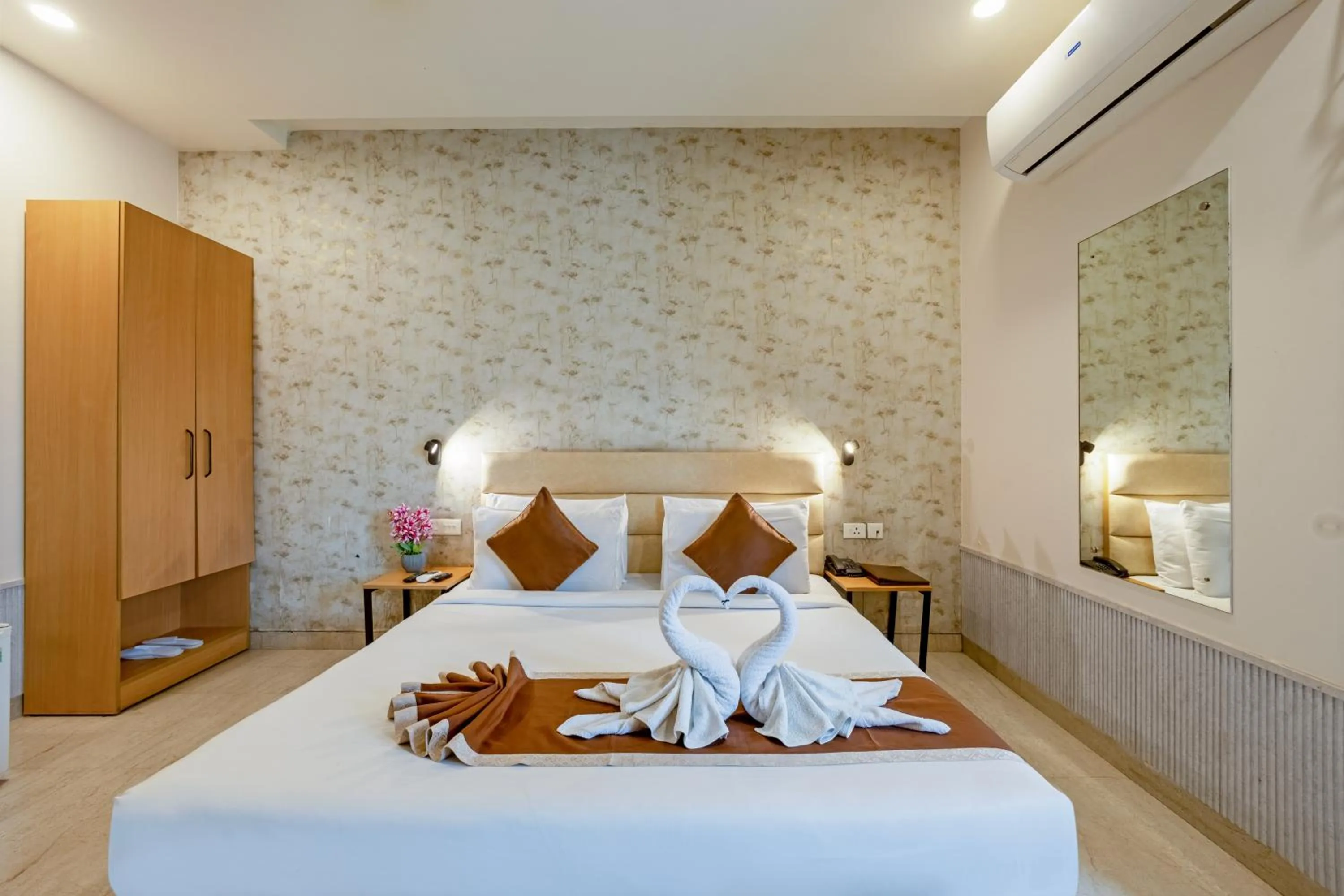 Bed in Aadat Hotel Subhash Chowk Gurgaon