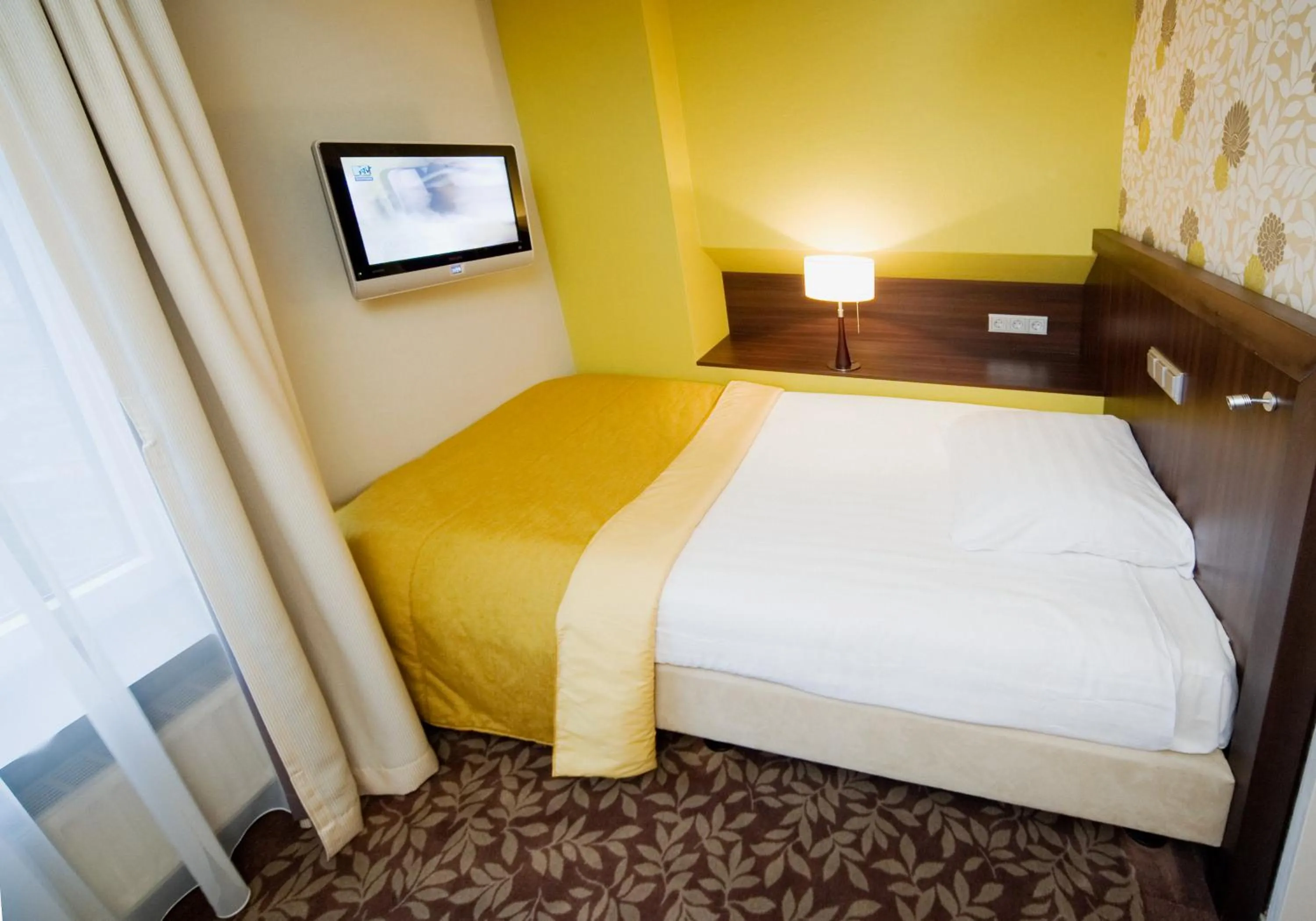 Bed in Hotel Van Walsum