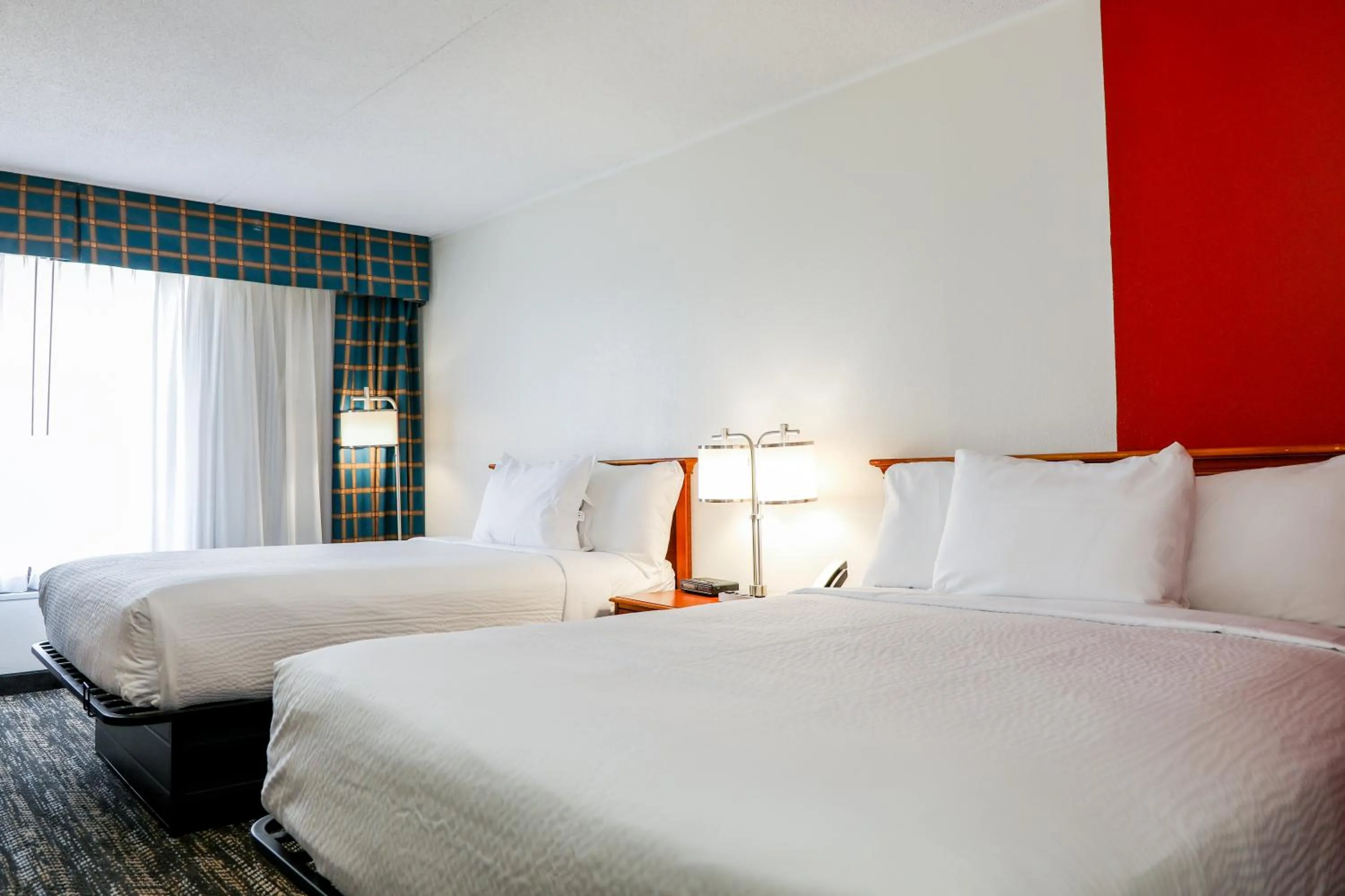 Bed in Ramada by Wyndham Cumberland Downtown