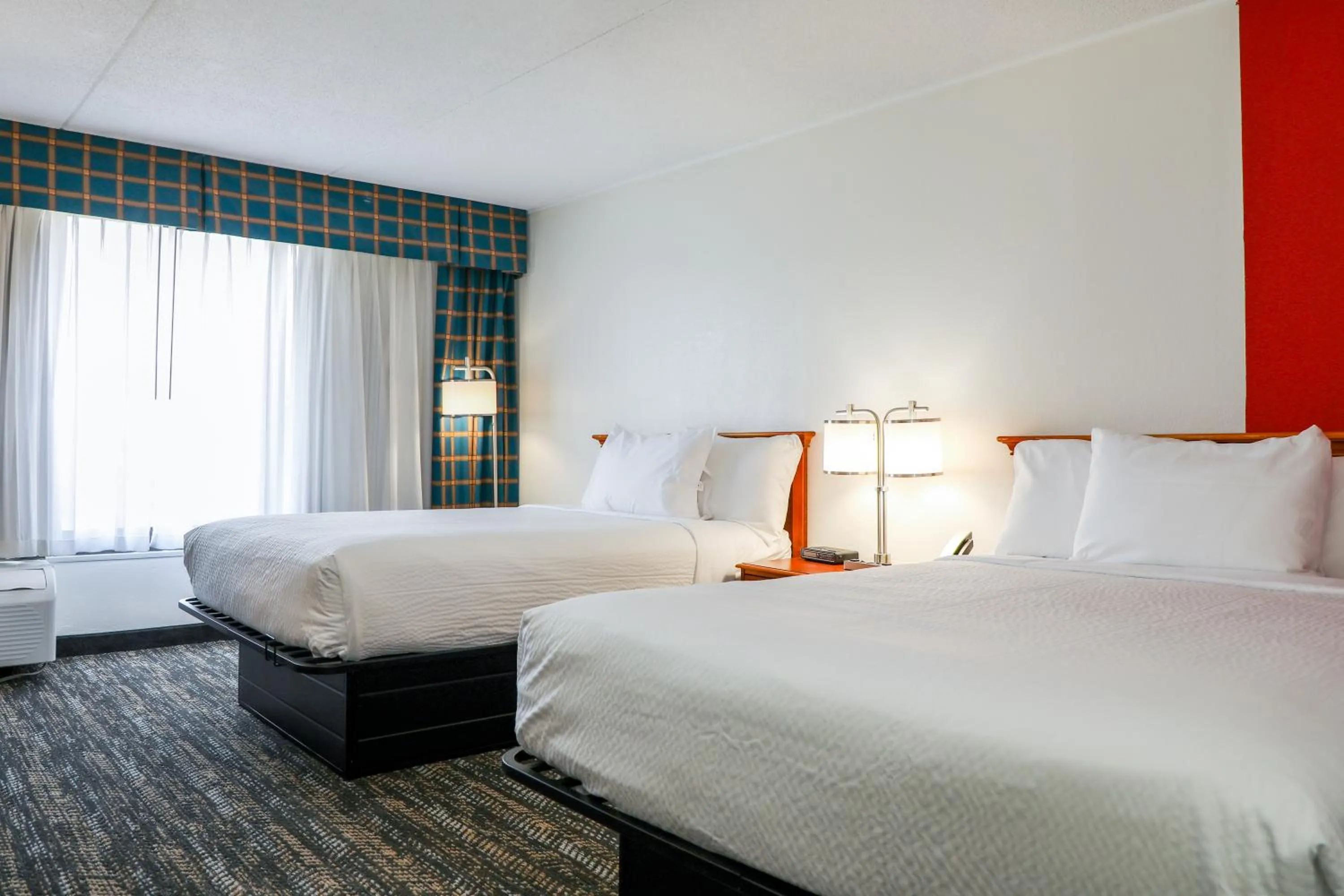 Photo of the whole room, Bed in Ramada by Wyndham Cumberland Downtown