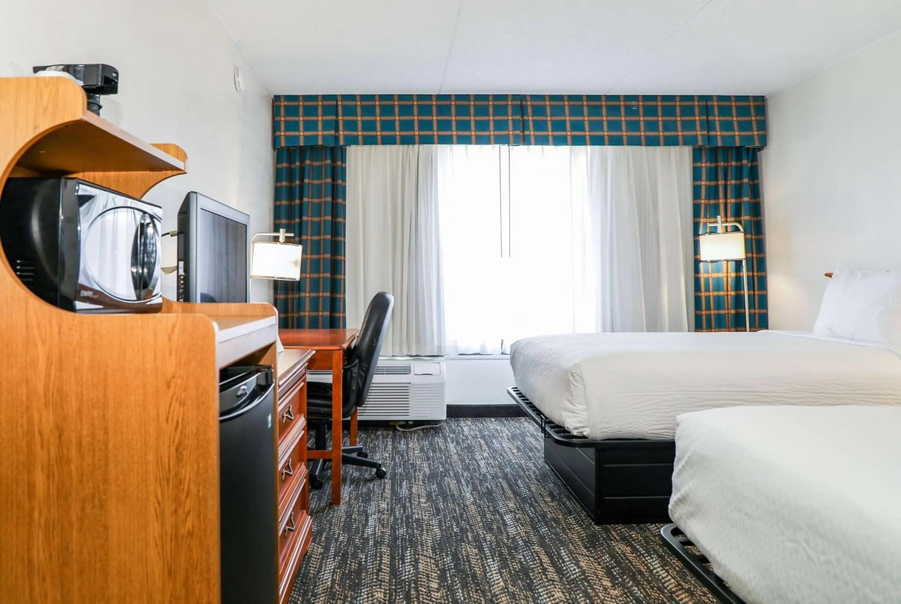 Photo of the whole room, Bed in Ramada by Wyndham Cumberland Downtown