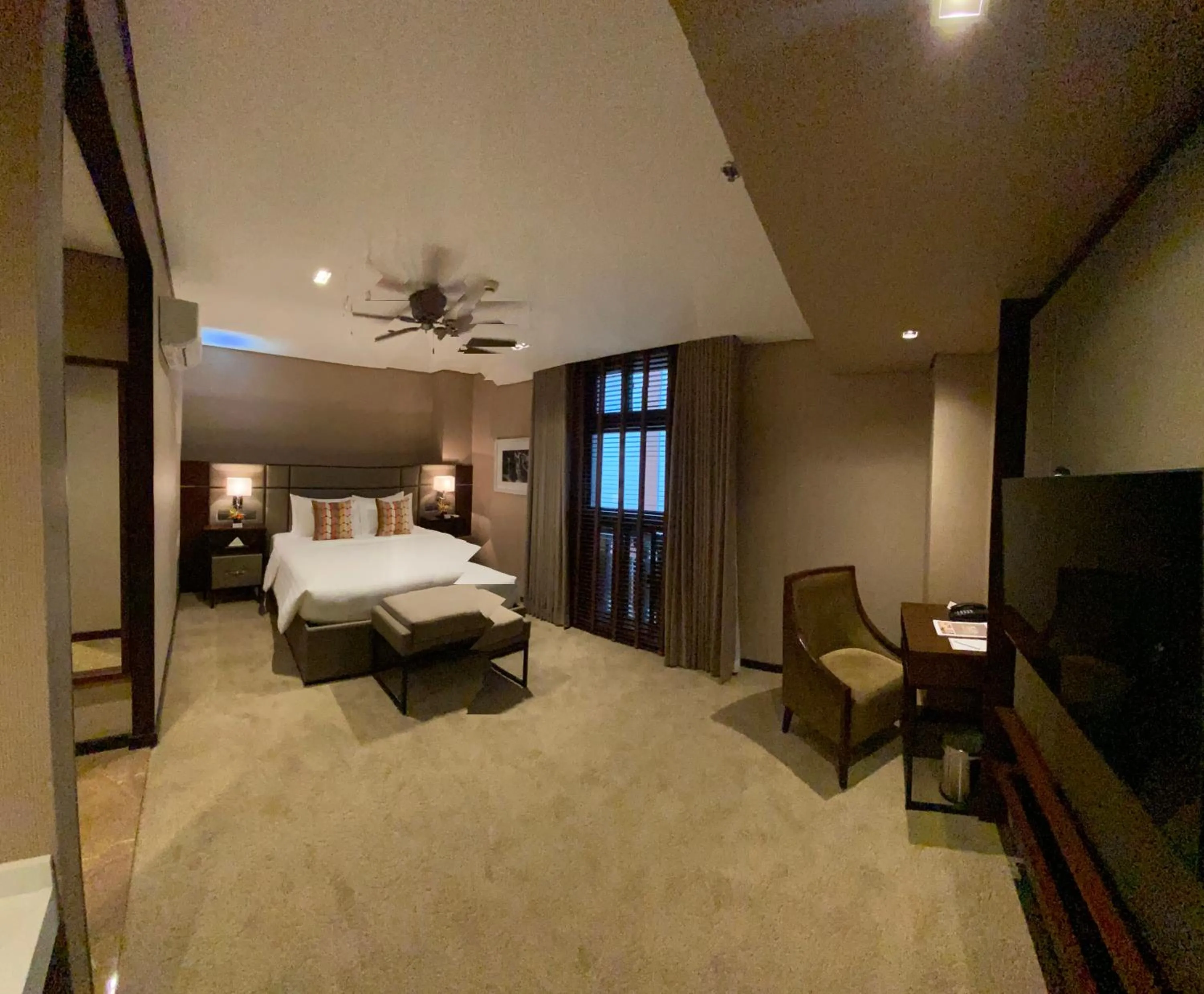 Photo of the whole room, Bed in The Plaza Garden Hotel and Residences