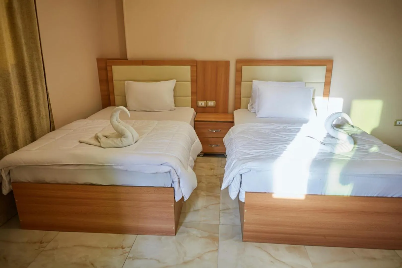 Bed in Grand Pyramid View Hotel