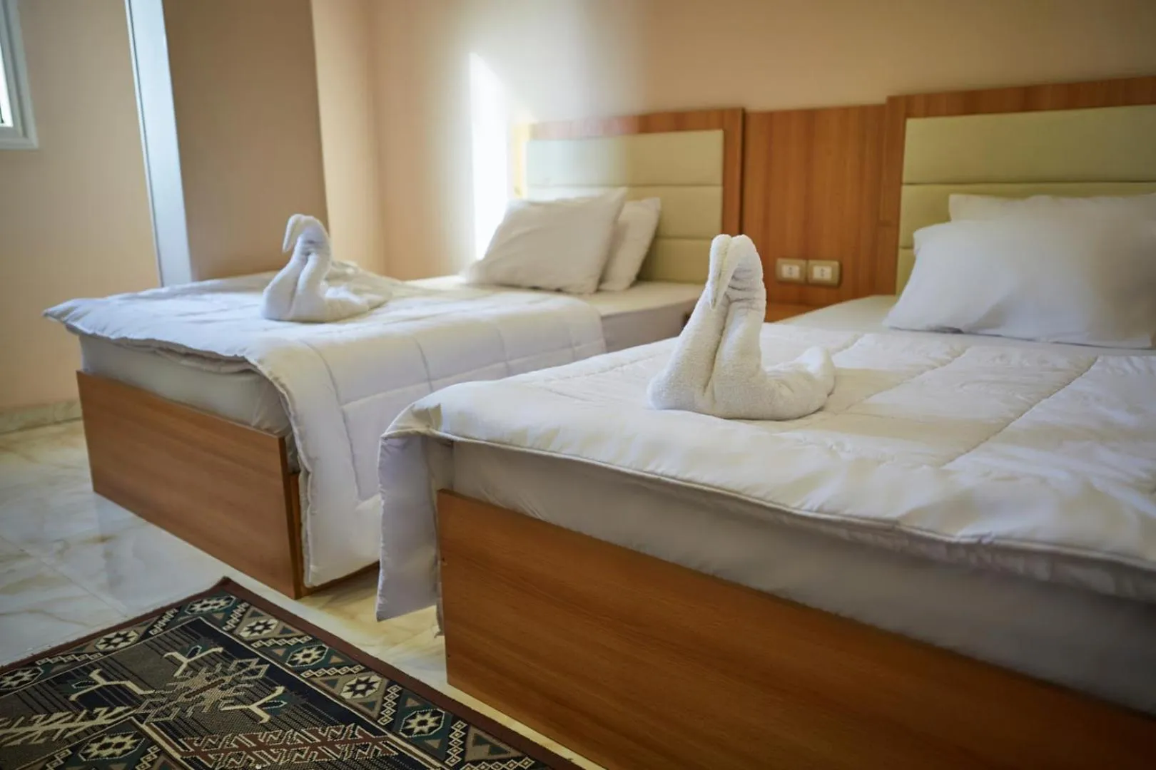 Bed in Grand Pyramid View Hotel