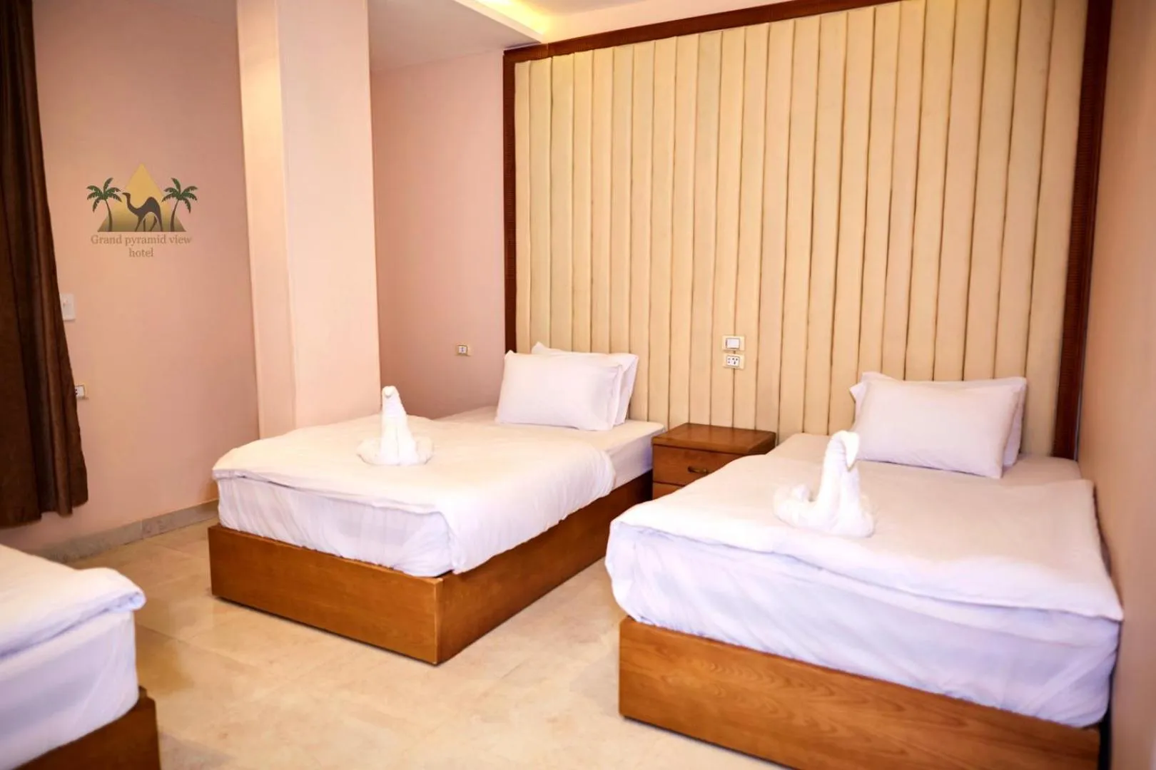 Bed in Grand Pyramid View Hotel