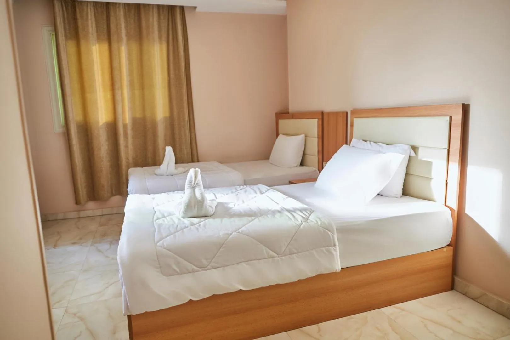 Bed in Grand Pyramid View Hotel