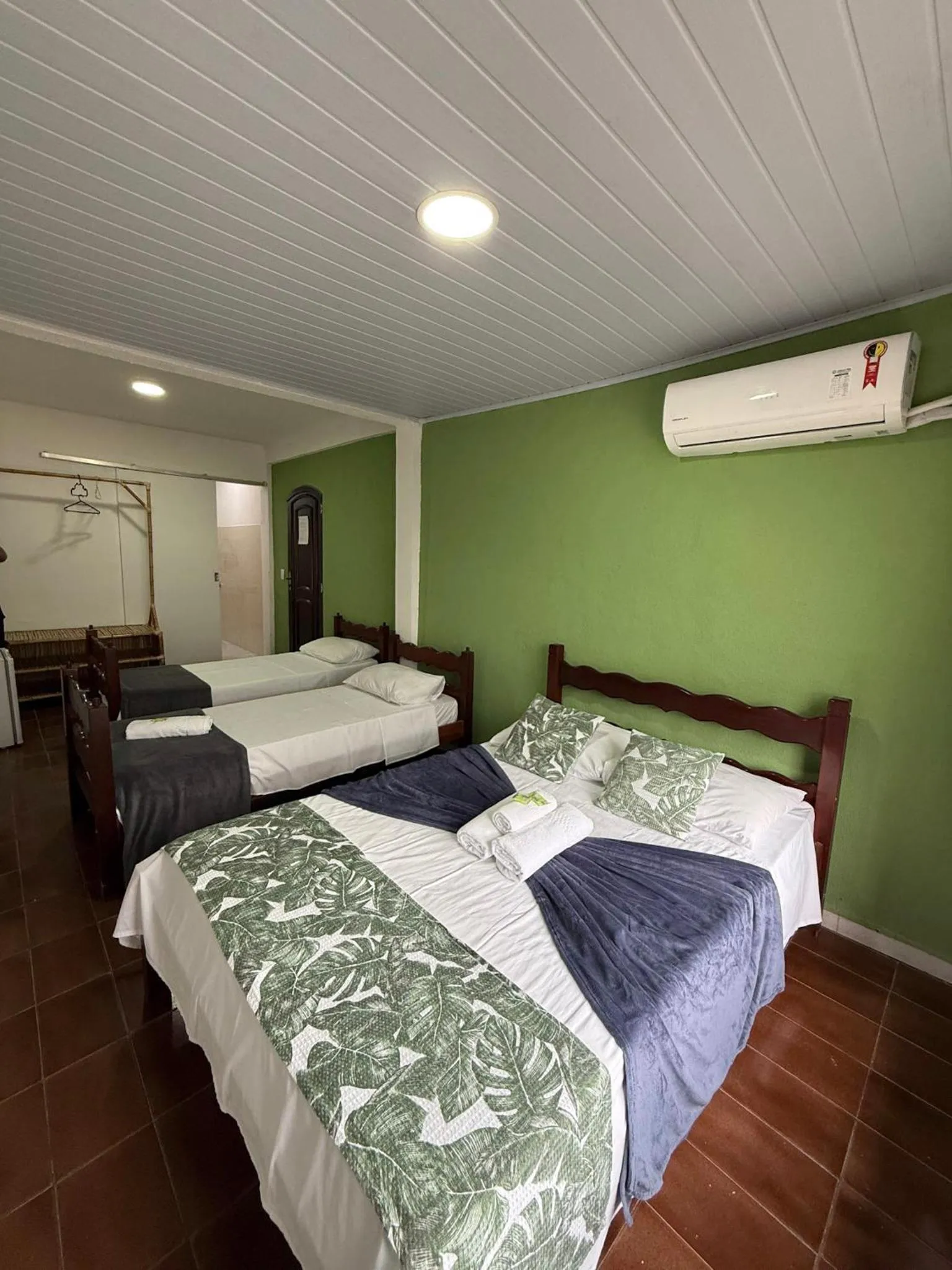 Bed in Pousada Lisamar