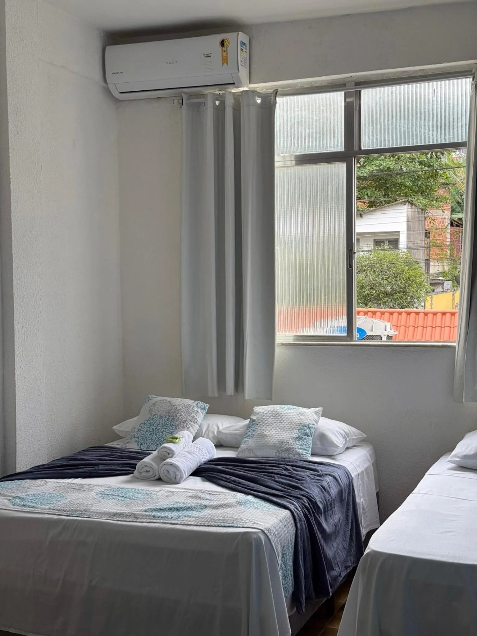 Bed in Pousada Lisamar