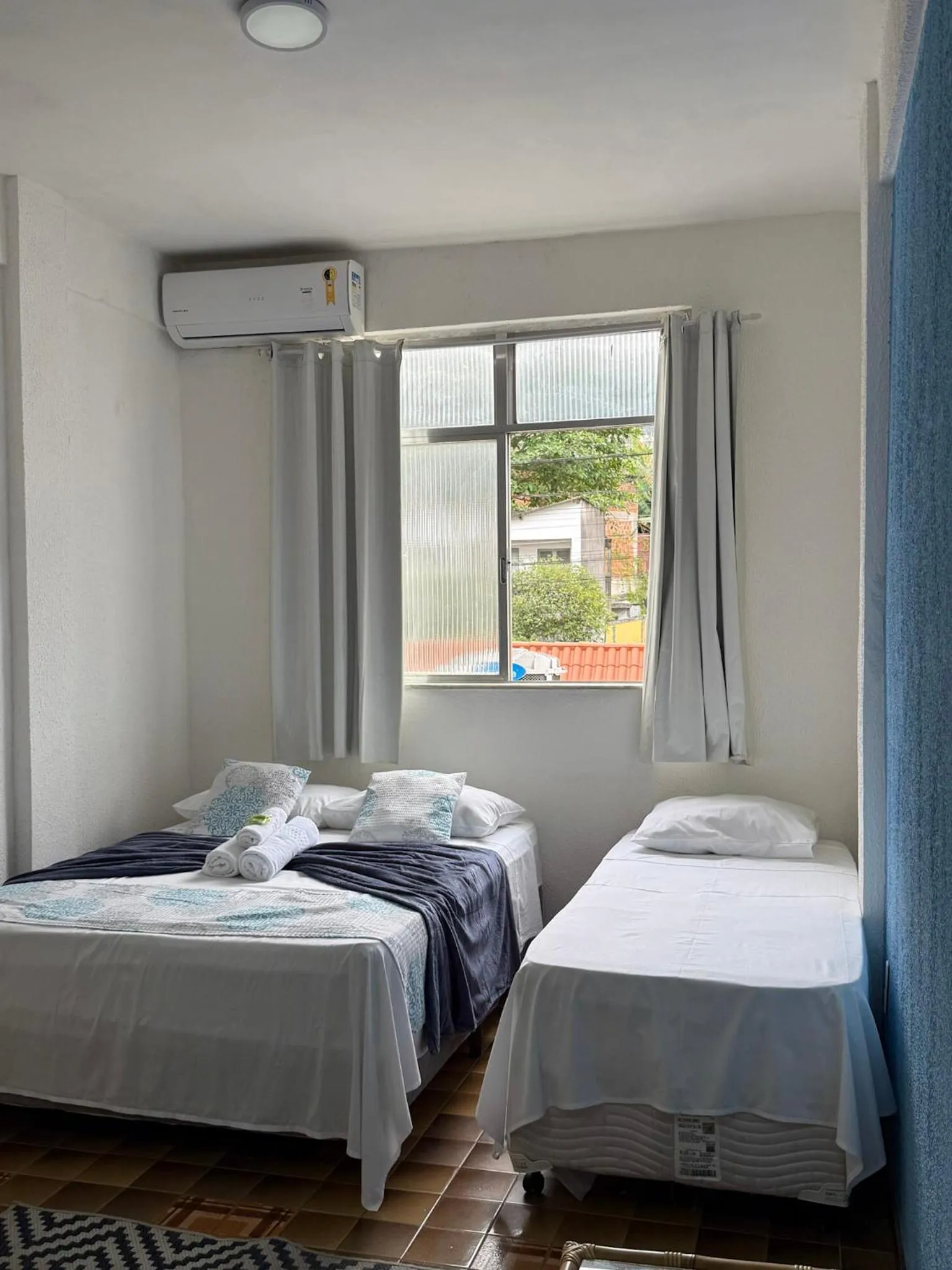 Bed in Pousada Lisamar