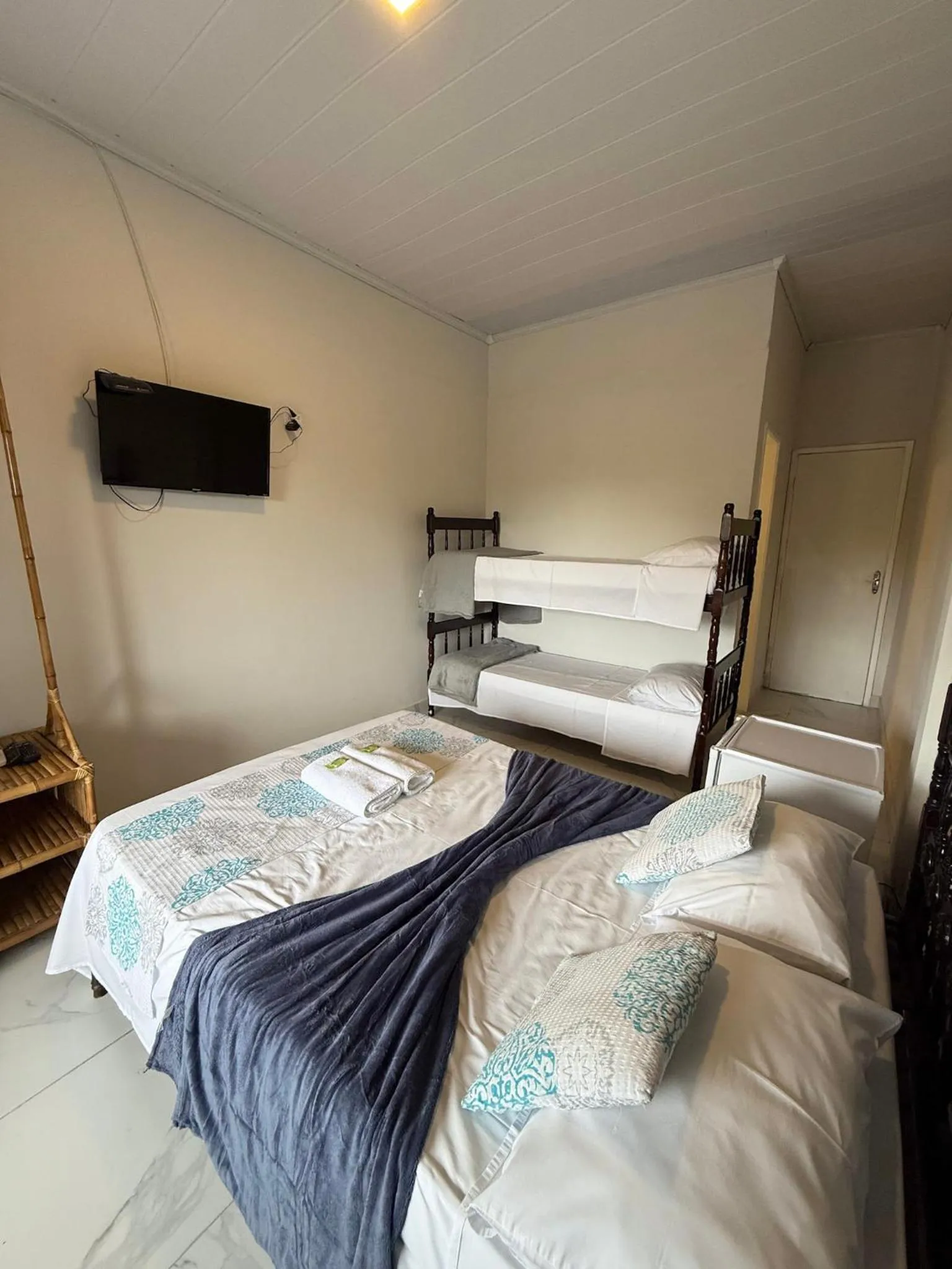 Bed in Pousada Lisamar