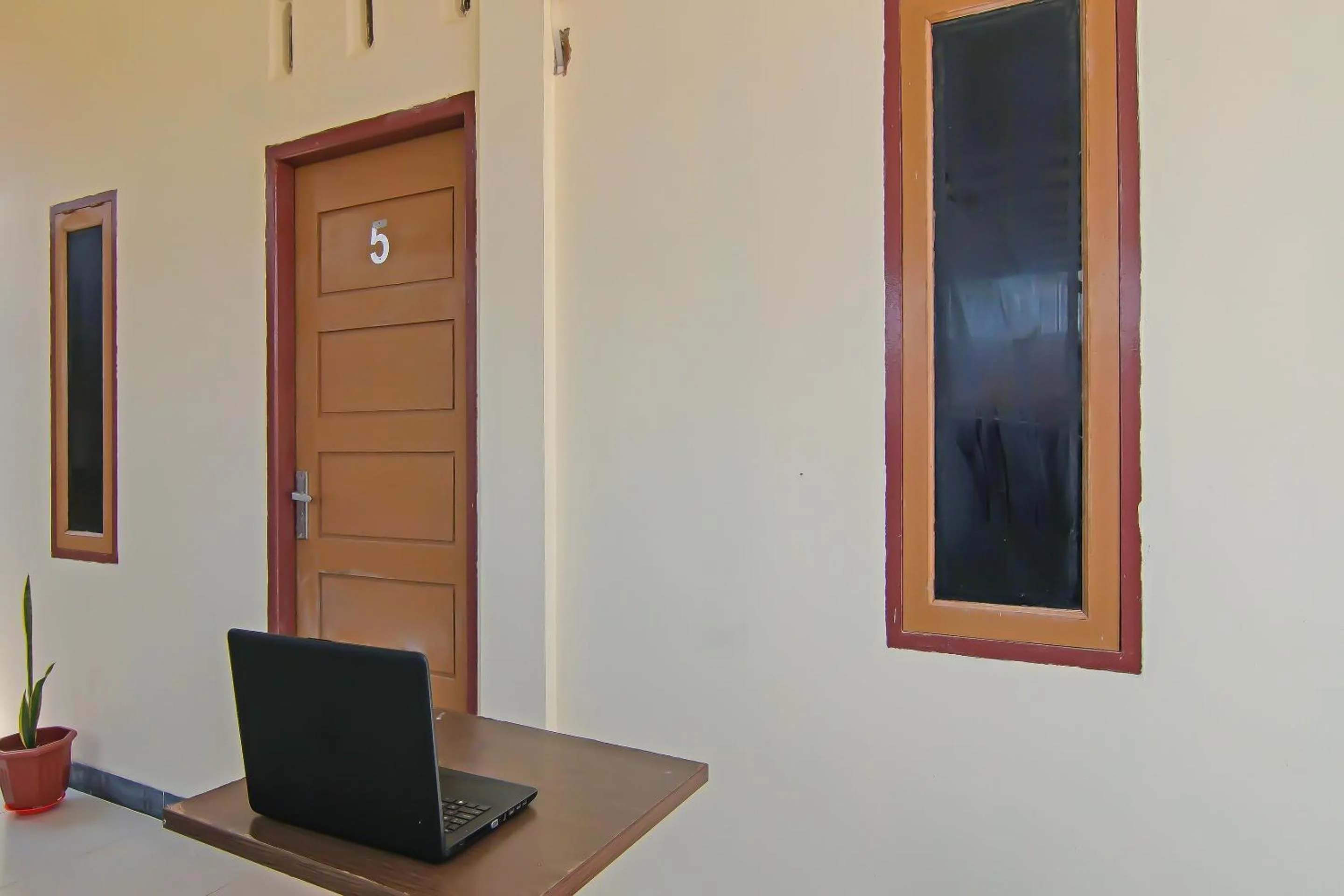 Lobby or reception in Hotel O Putri Guest House Syariah Near SPBU Rimbo Panjang