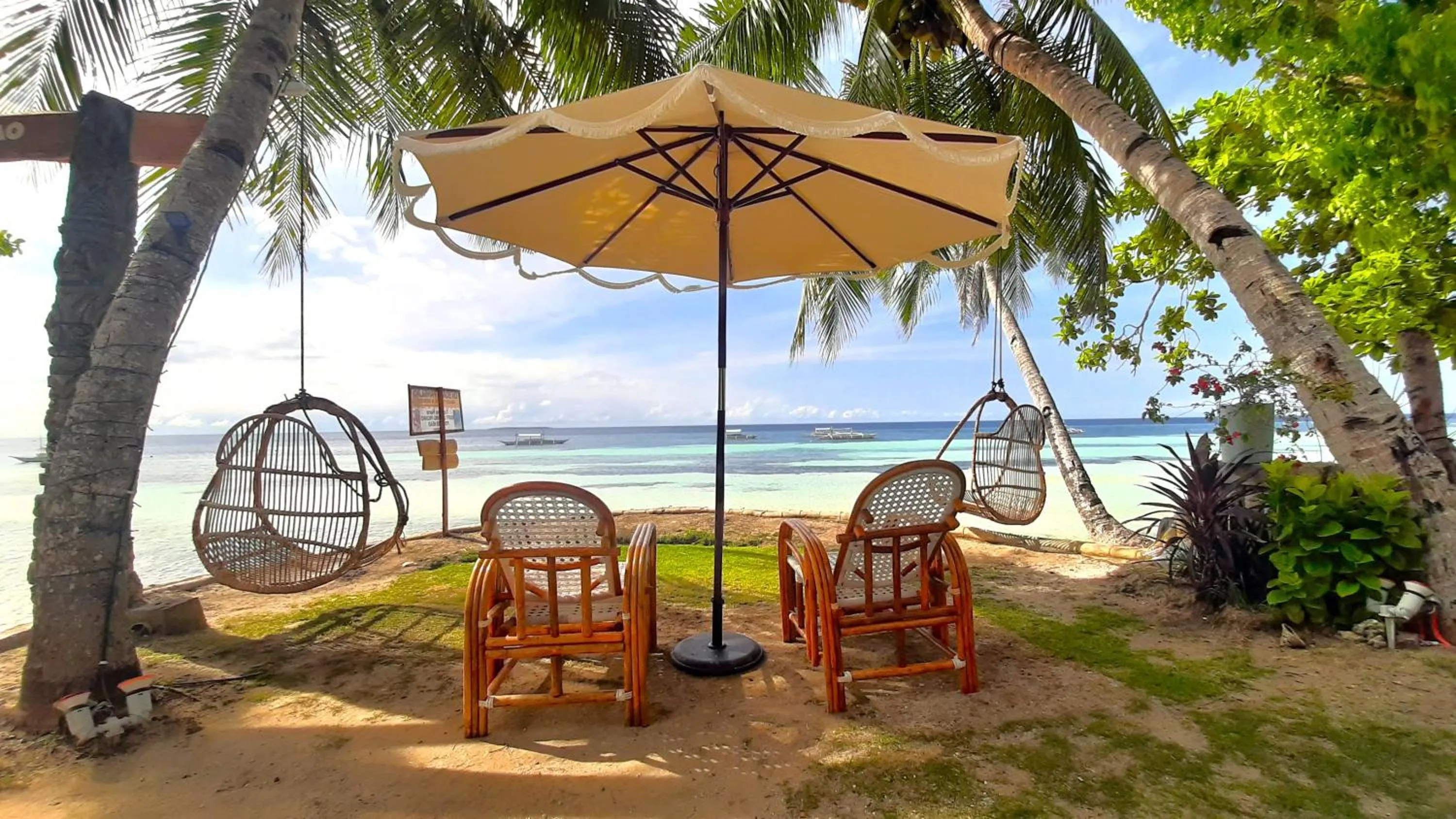 Garden in On Board Panglao Beach Hostel & Resort with FREE MOTORBIKE