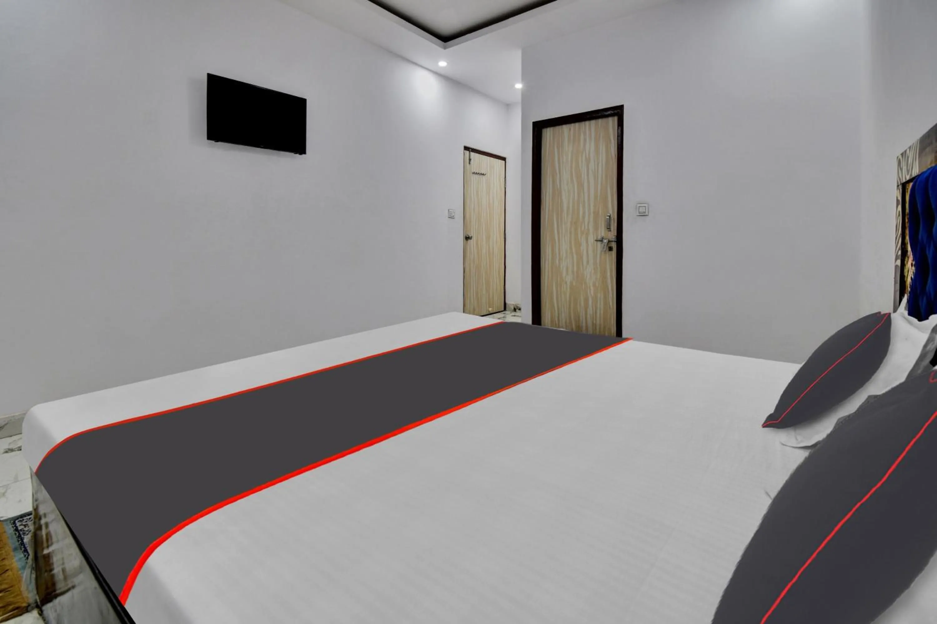 Bedroom, Bed in Hotel O by OYO Royal Paradise