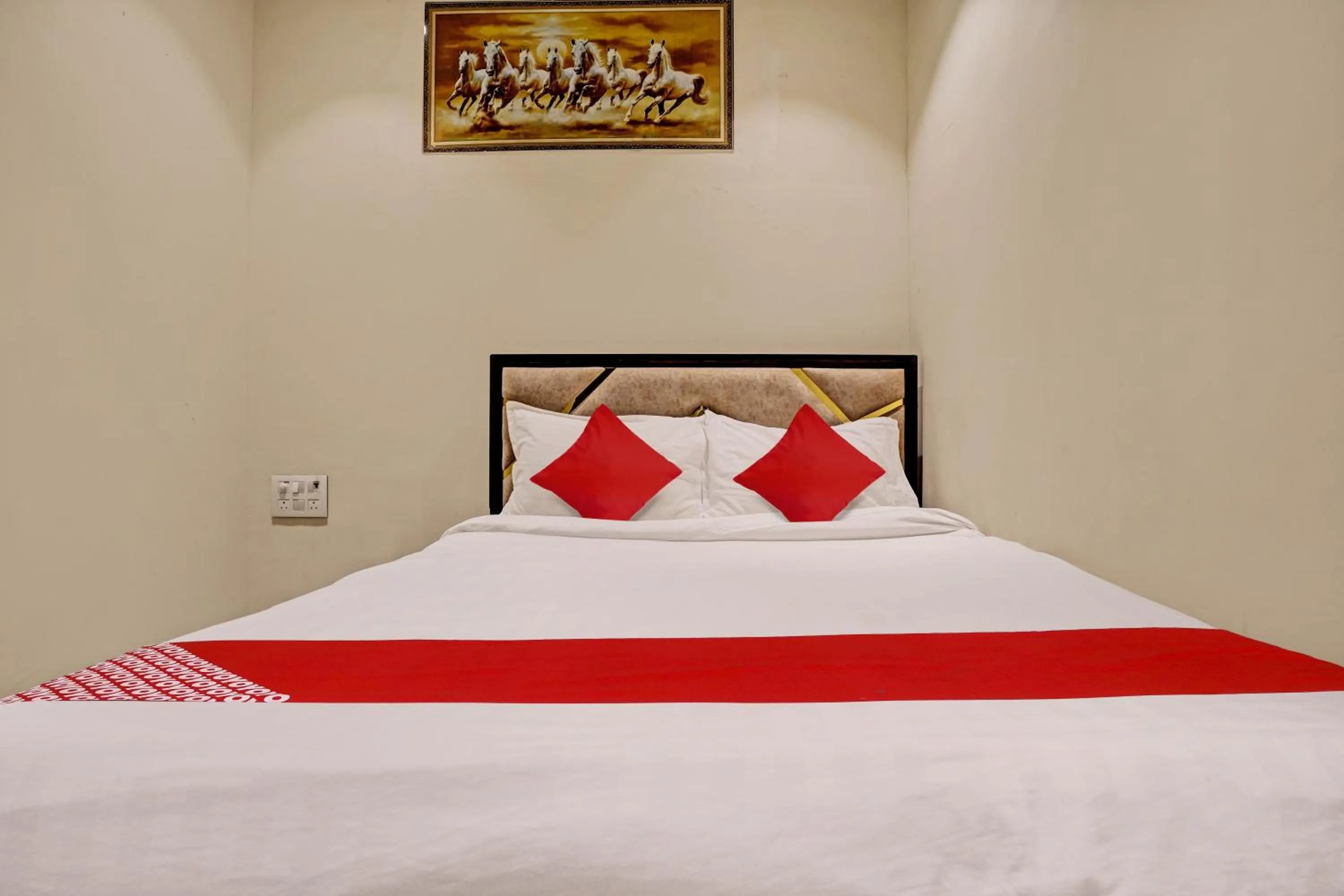 Bedroom in Hotel O NK Grand