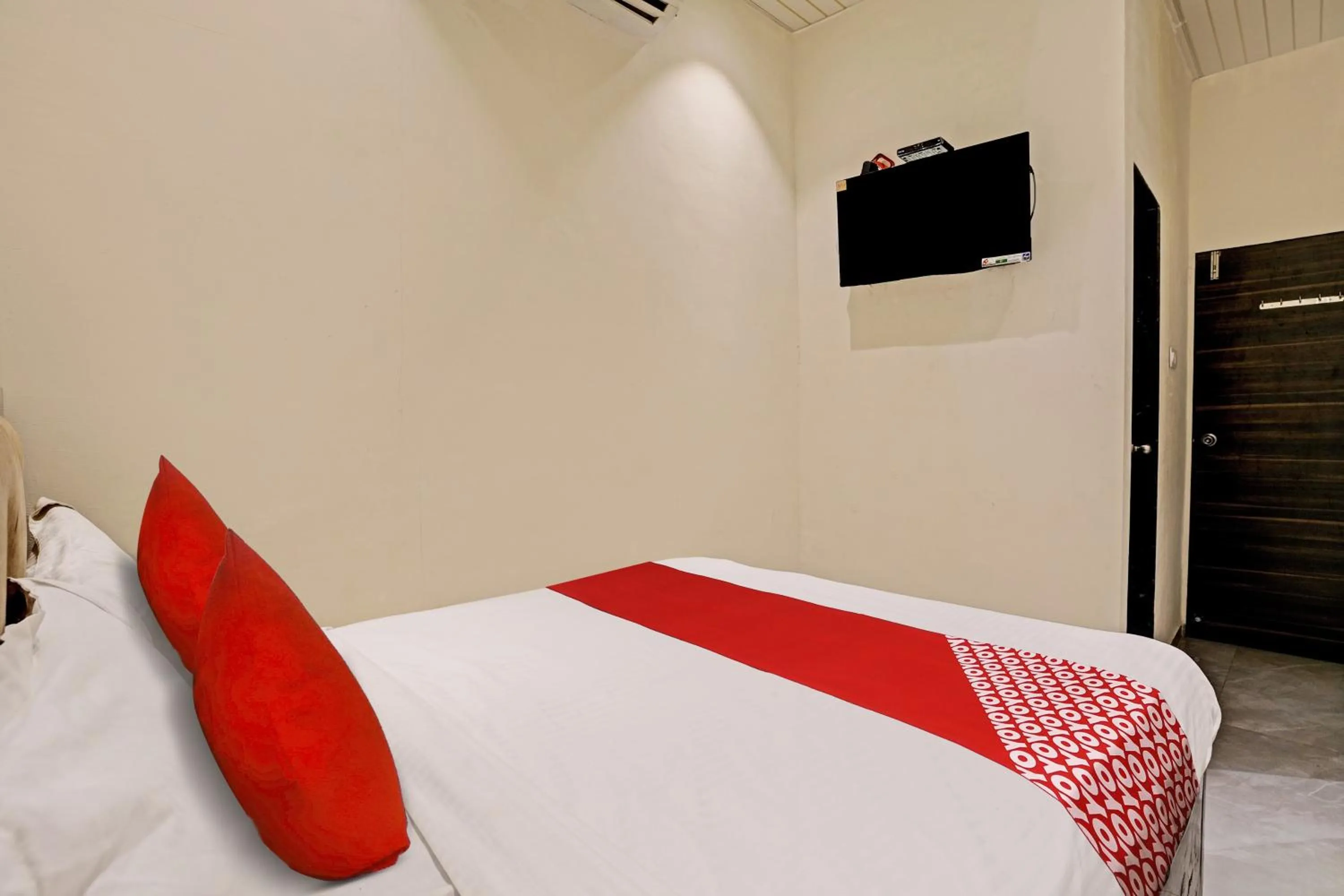 Bedroom in Hotel O NK Grand