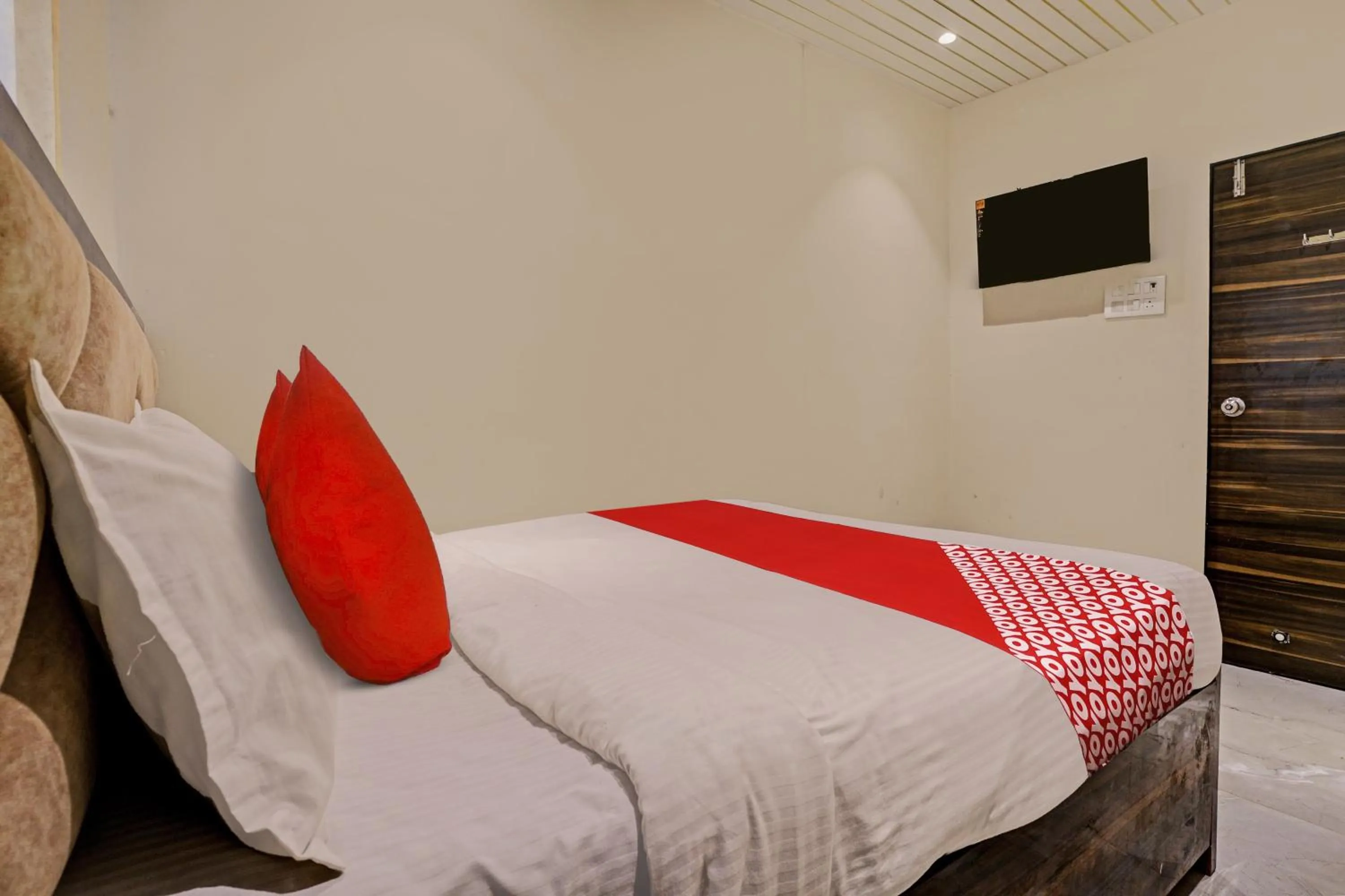 Bedroom in Hotel O NK Grand