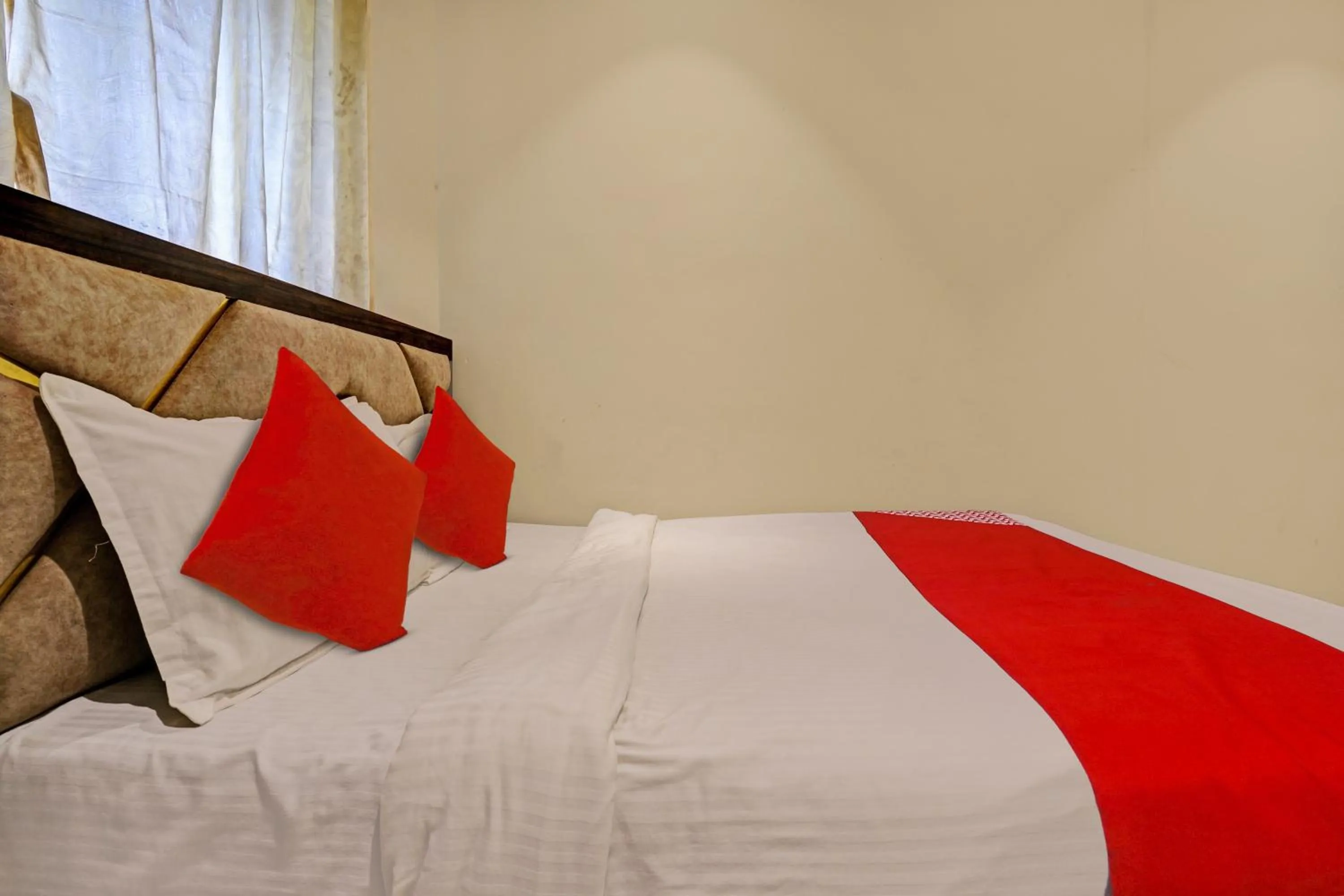 Bedroom in Hotel O NK Grand