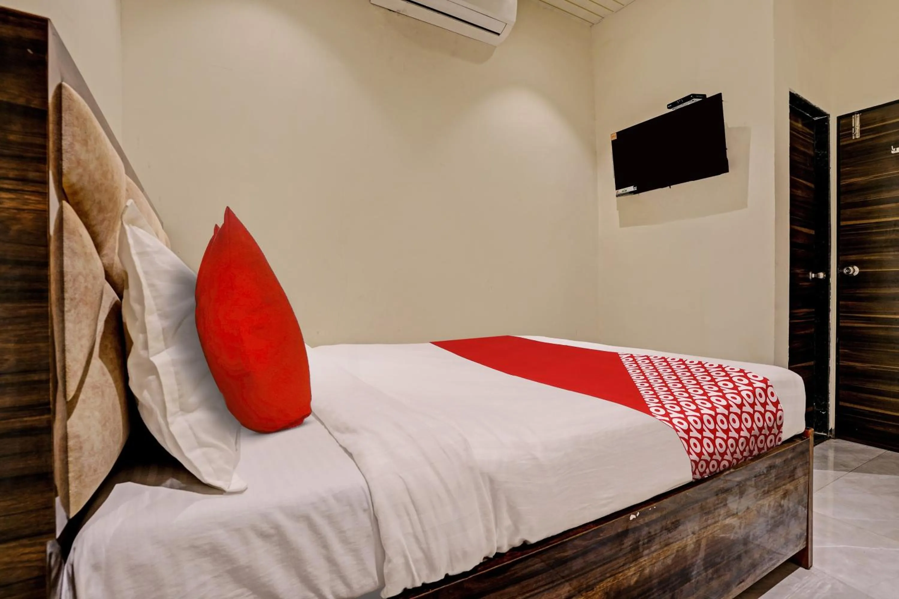 Bedroom in Hotel O NK Grand