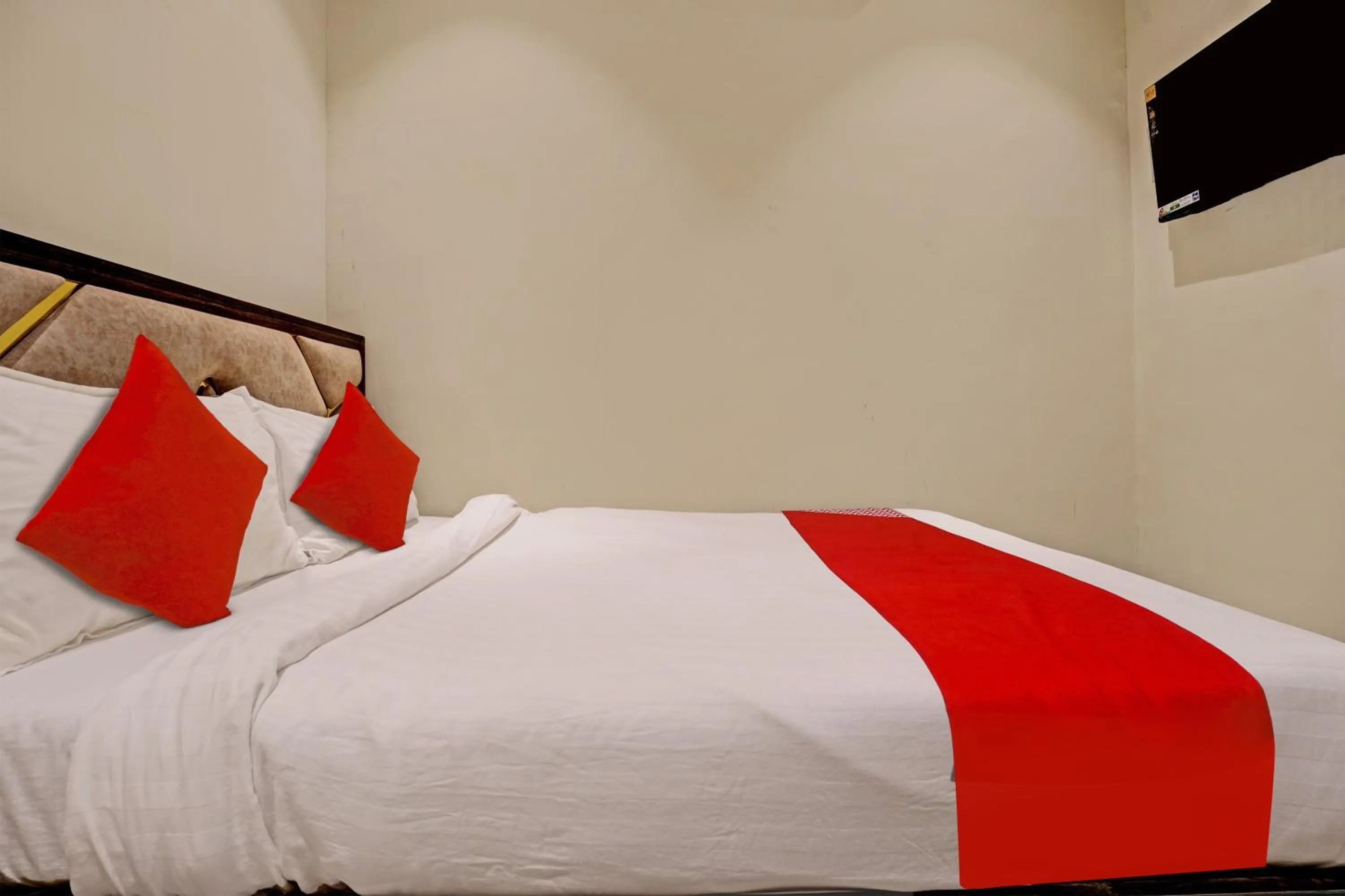 Bedroom in Hotel O NK Grand