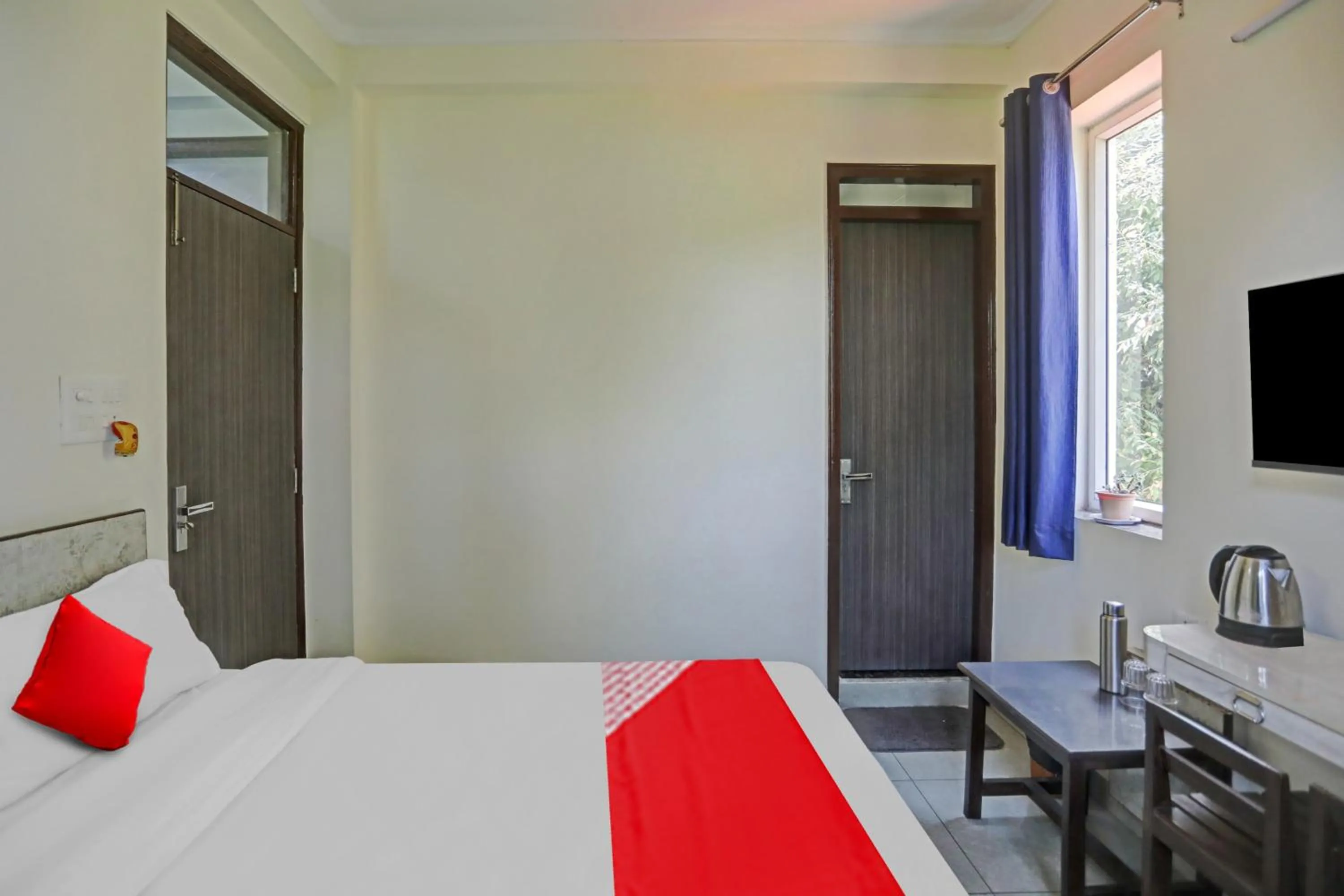 Bedroom in Hotel O by OYO Serene Escape