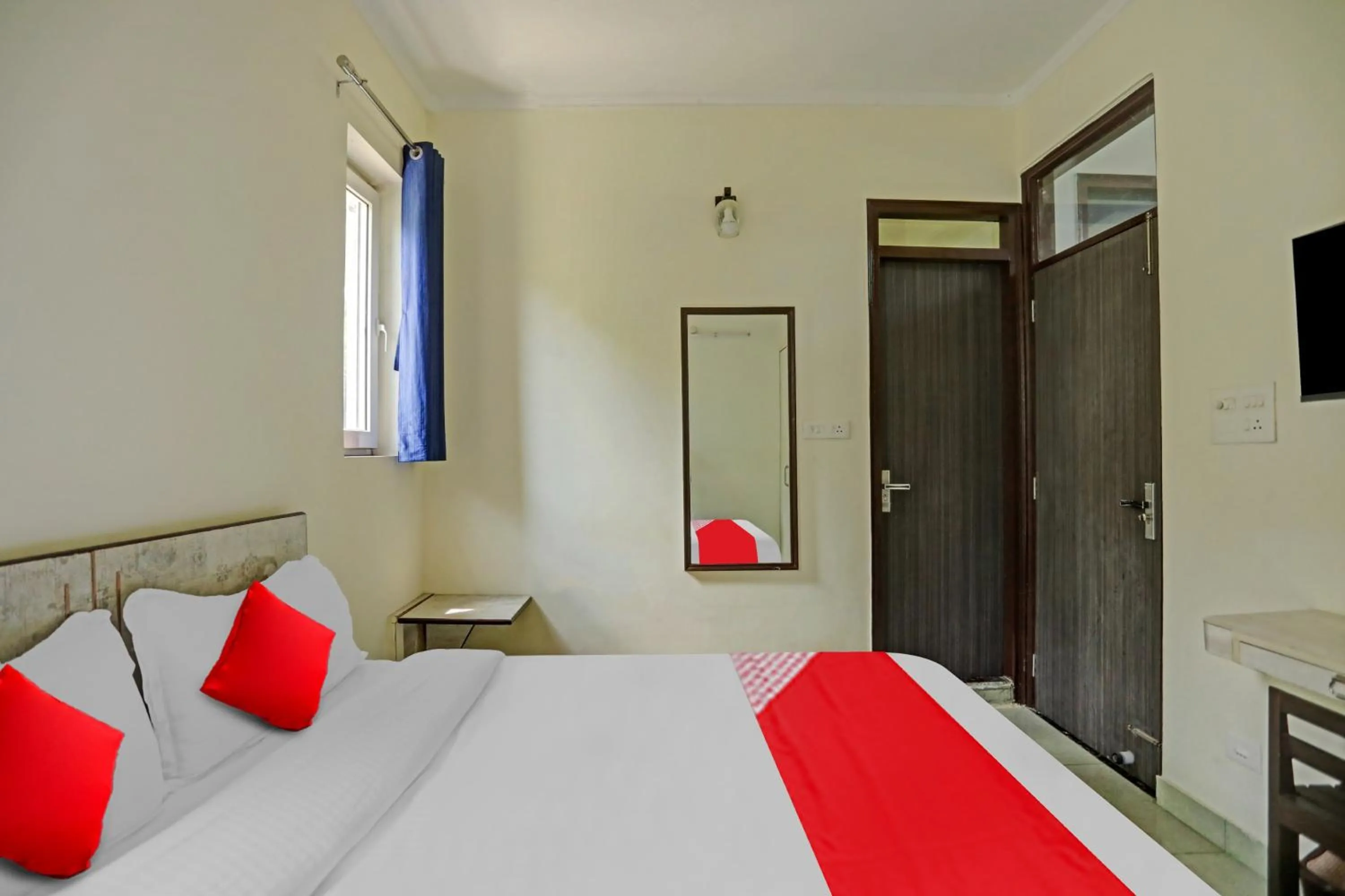 Bedroom in Hotel O by OYO Serene Escape