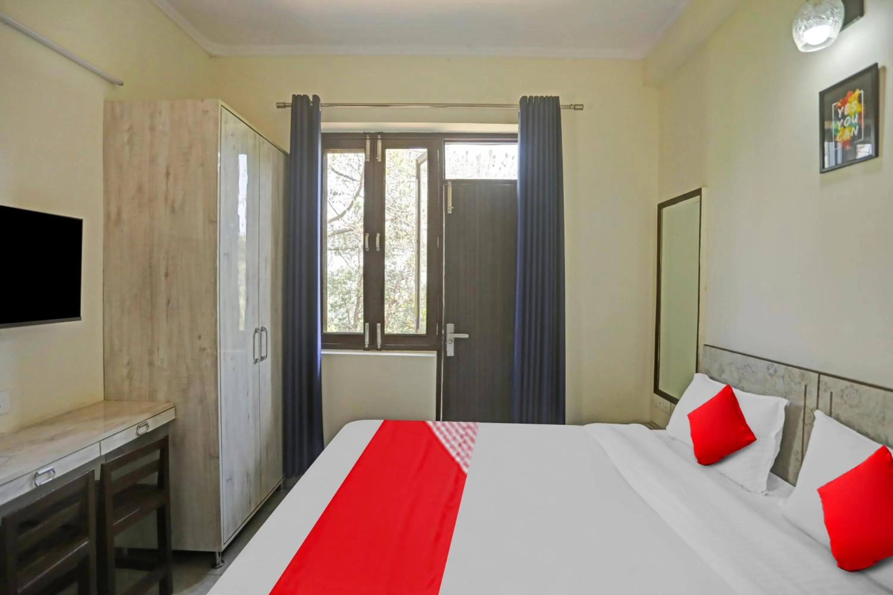 Bedroom in Hotel O by OYO Serene Escape