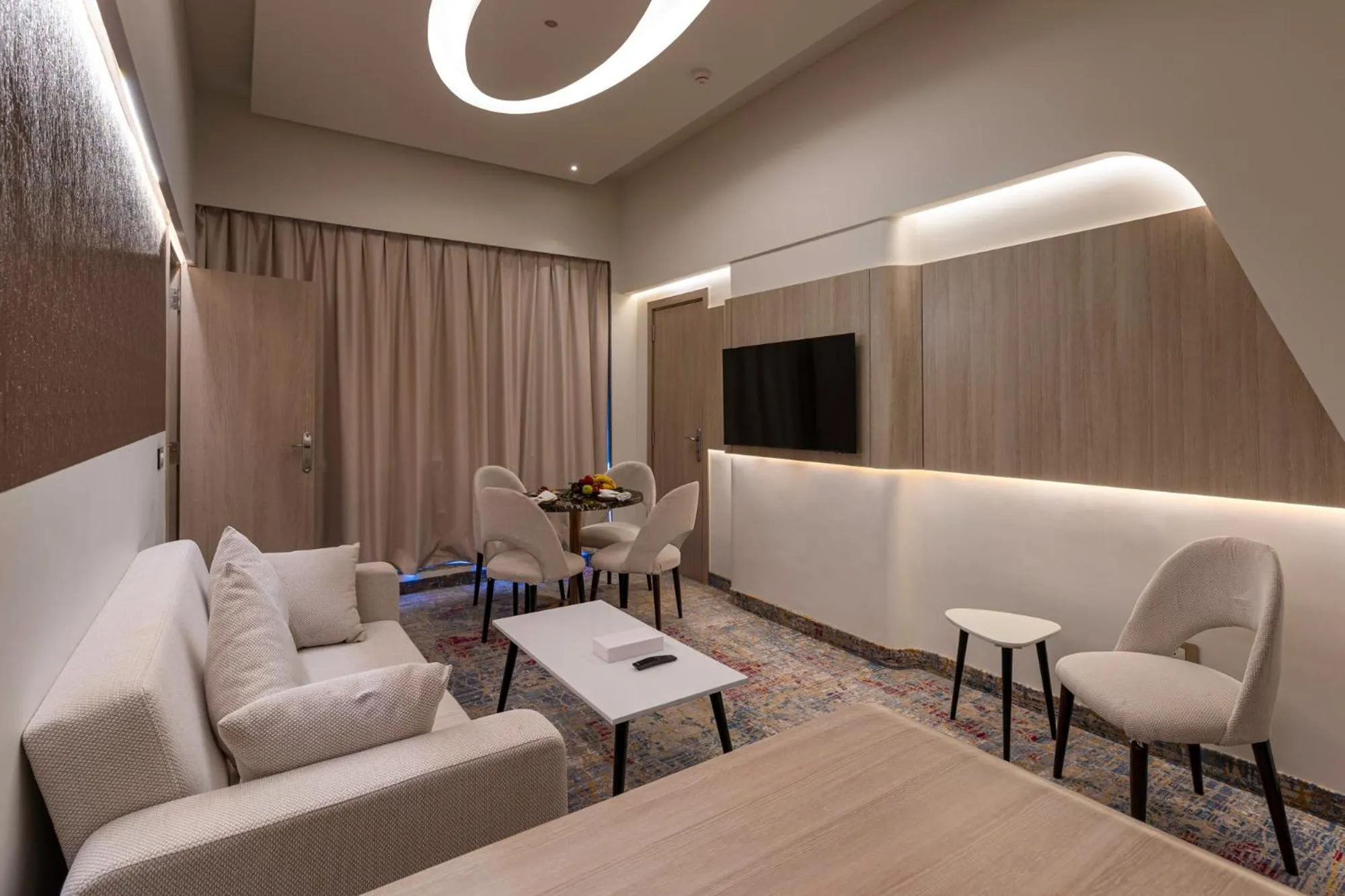 Living room in Crowne Plaza Alexandria Mirage by IHG