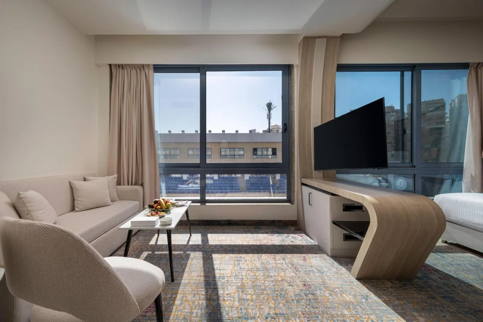 Living room in Crowne Plaza Alexandria Mirage by IHG