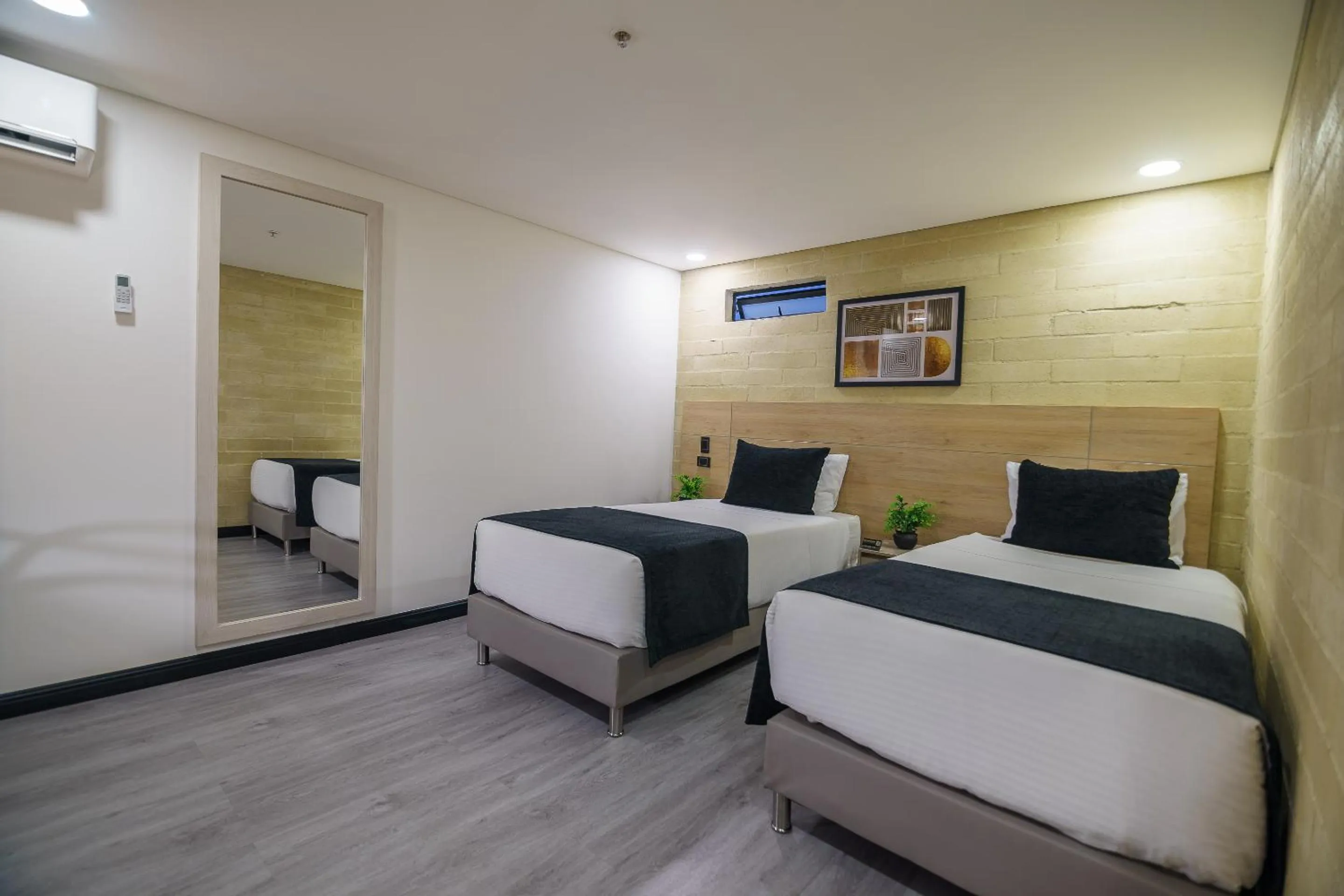 Photo of the whole room, Bed in First Class Hotel